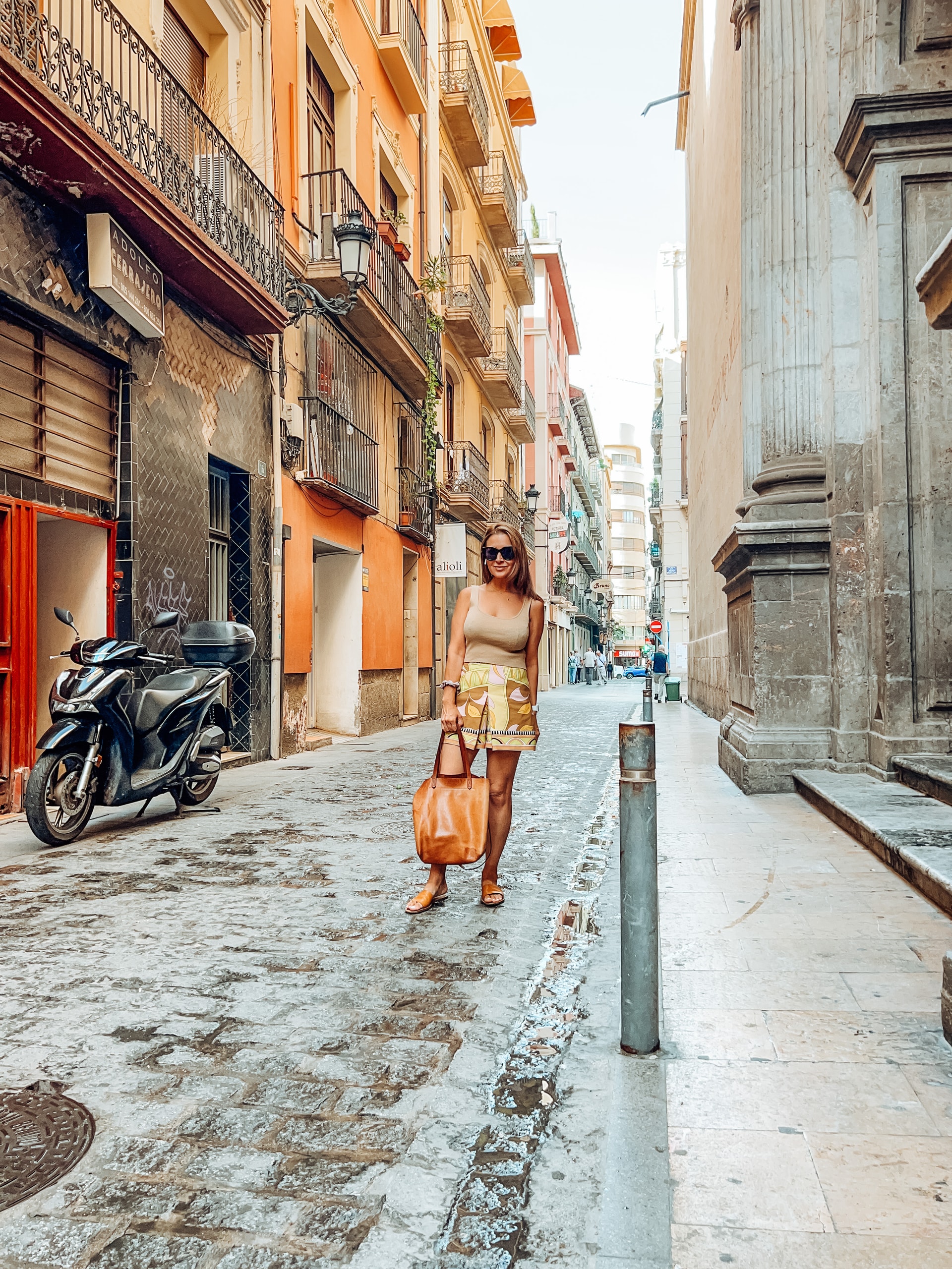 Travel advisor standing in an ancient street