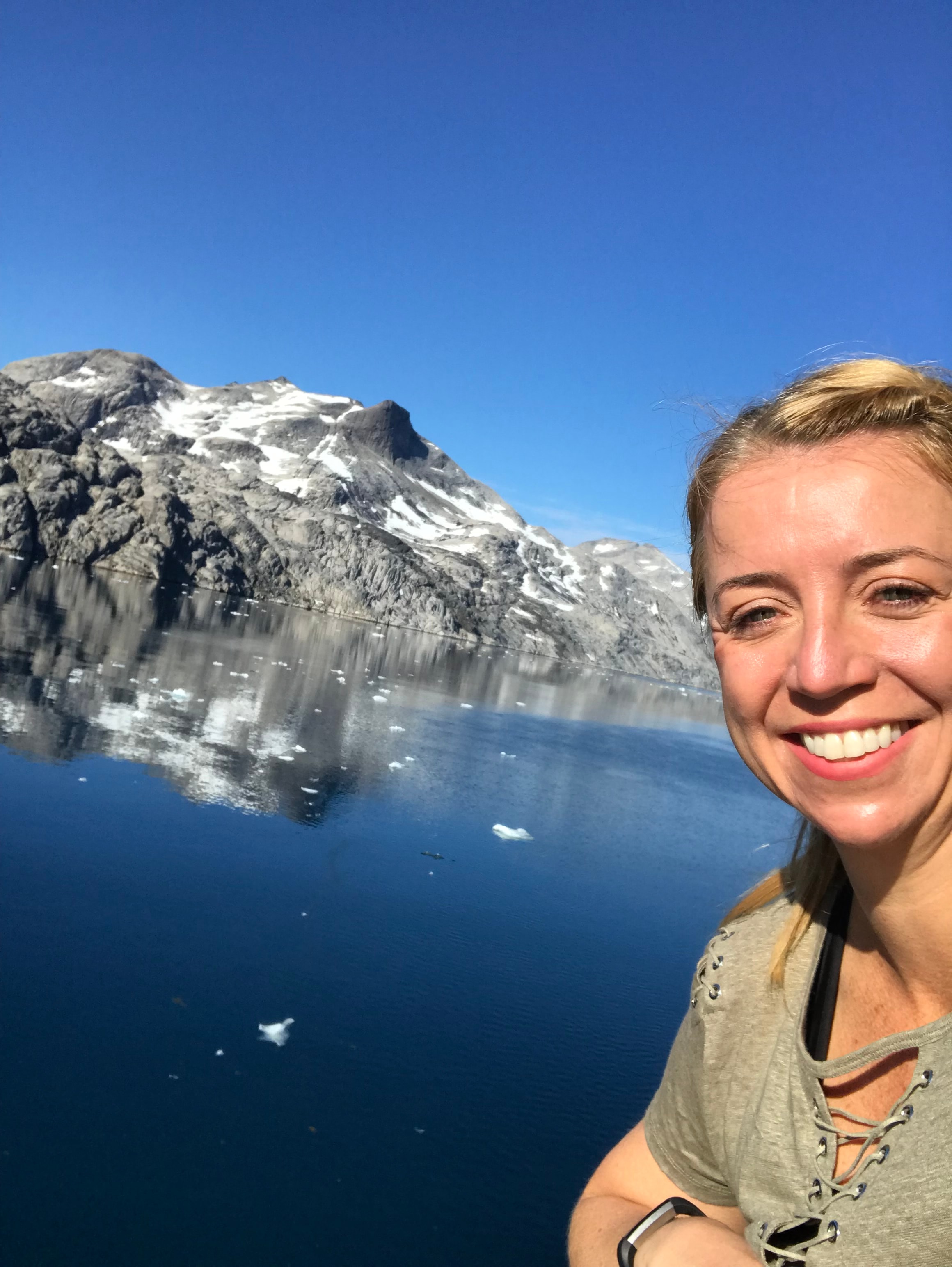 Picture of Marci with snow covered mountain