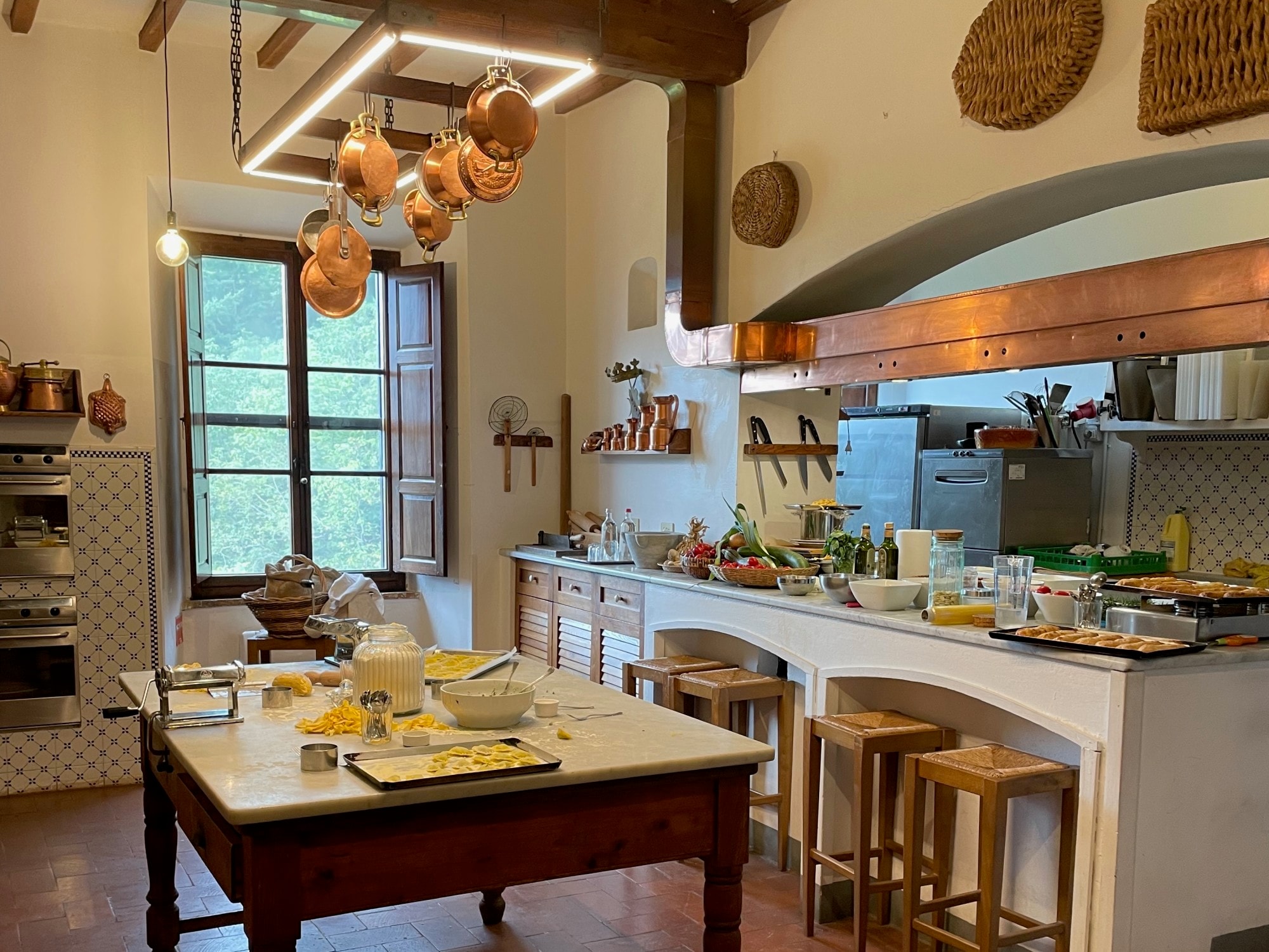 A cute kitchen with brown and white interior.