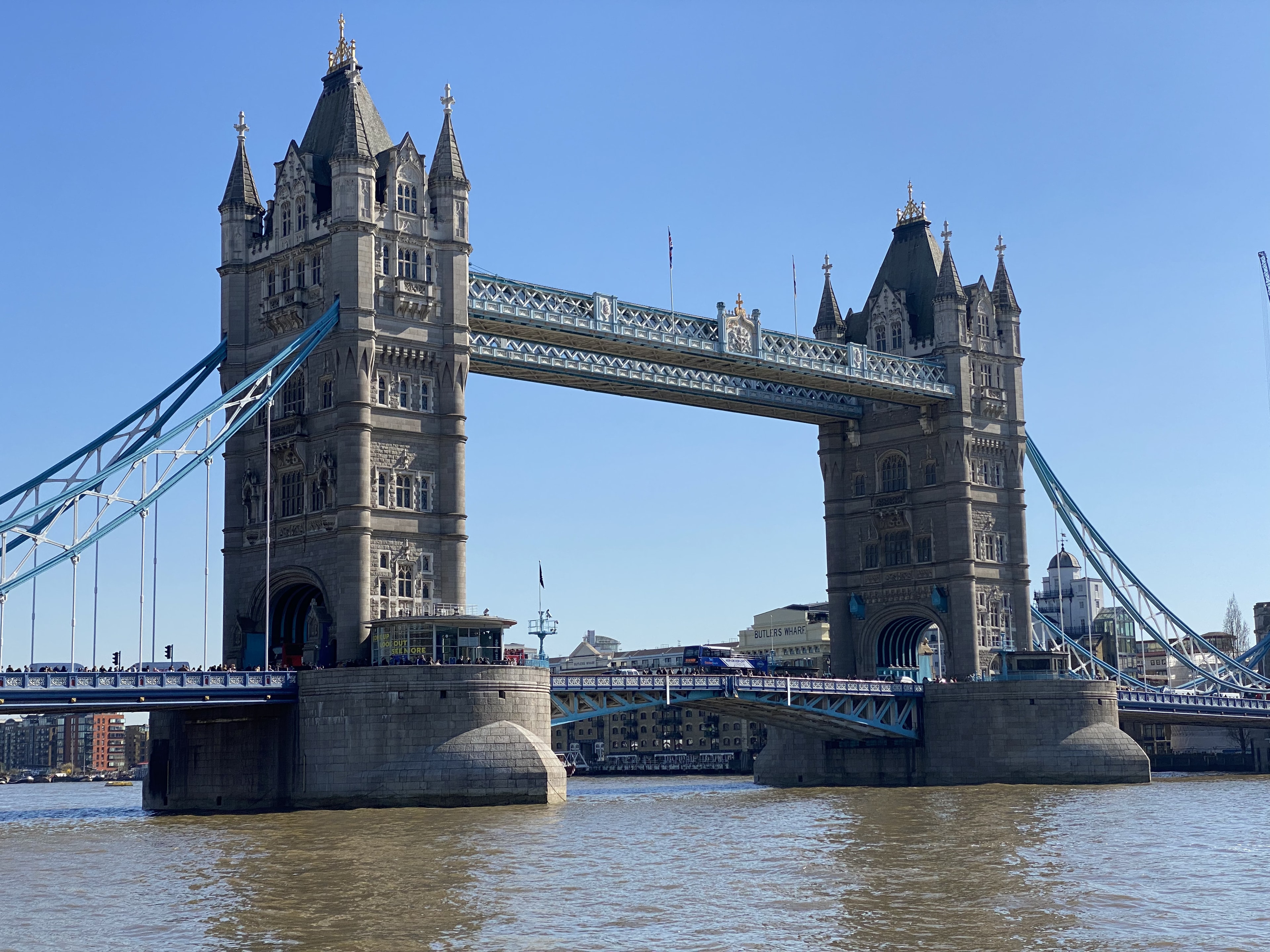 london bridge during the day time with clear skies in the distance. 