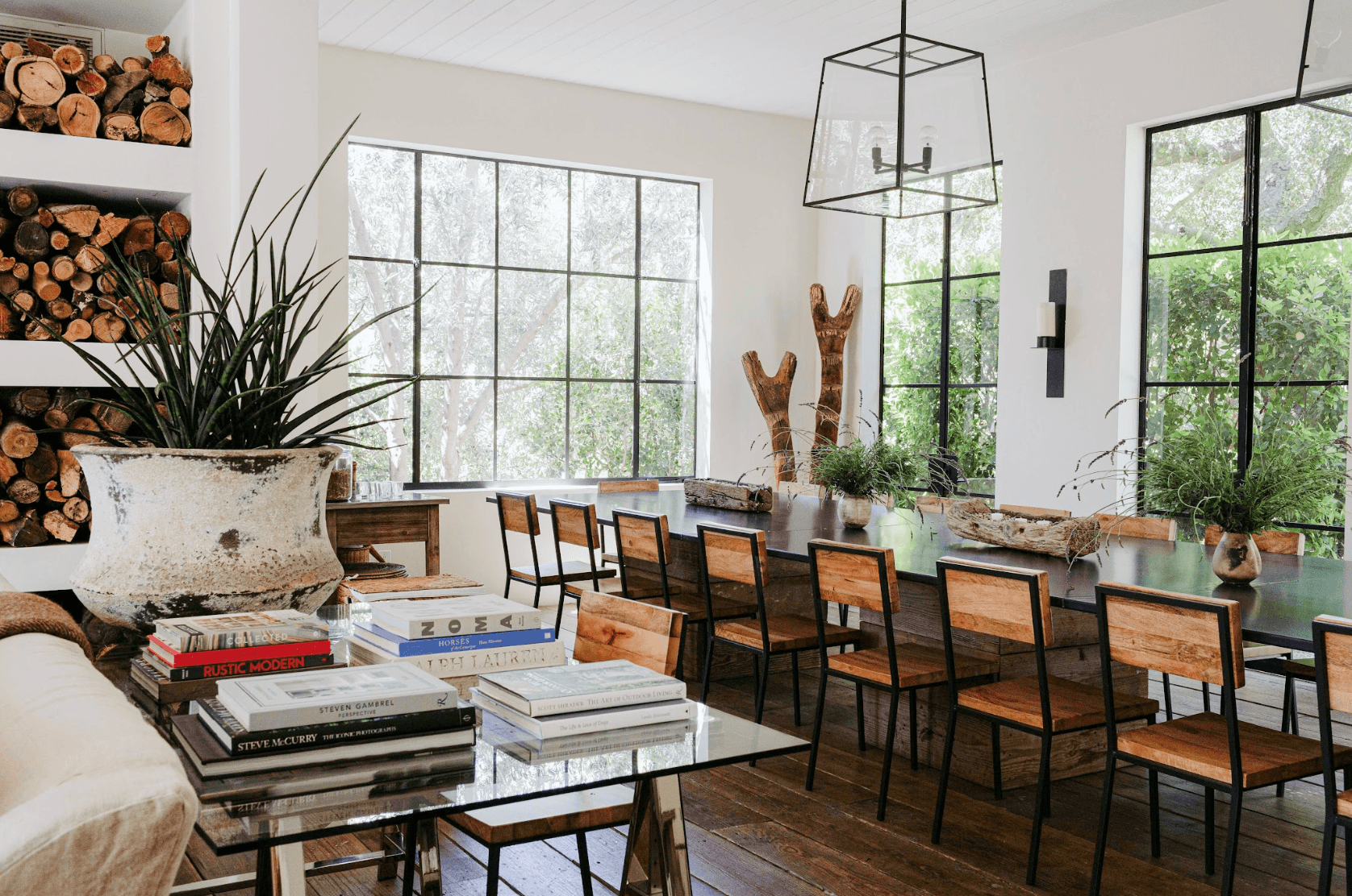 an airy dining room with wooden chairs