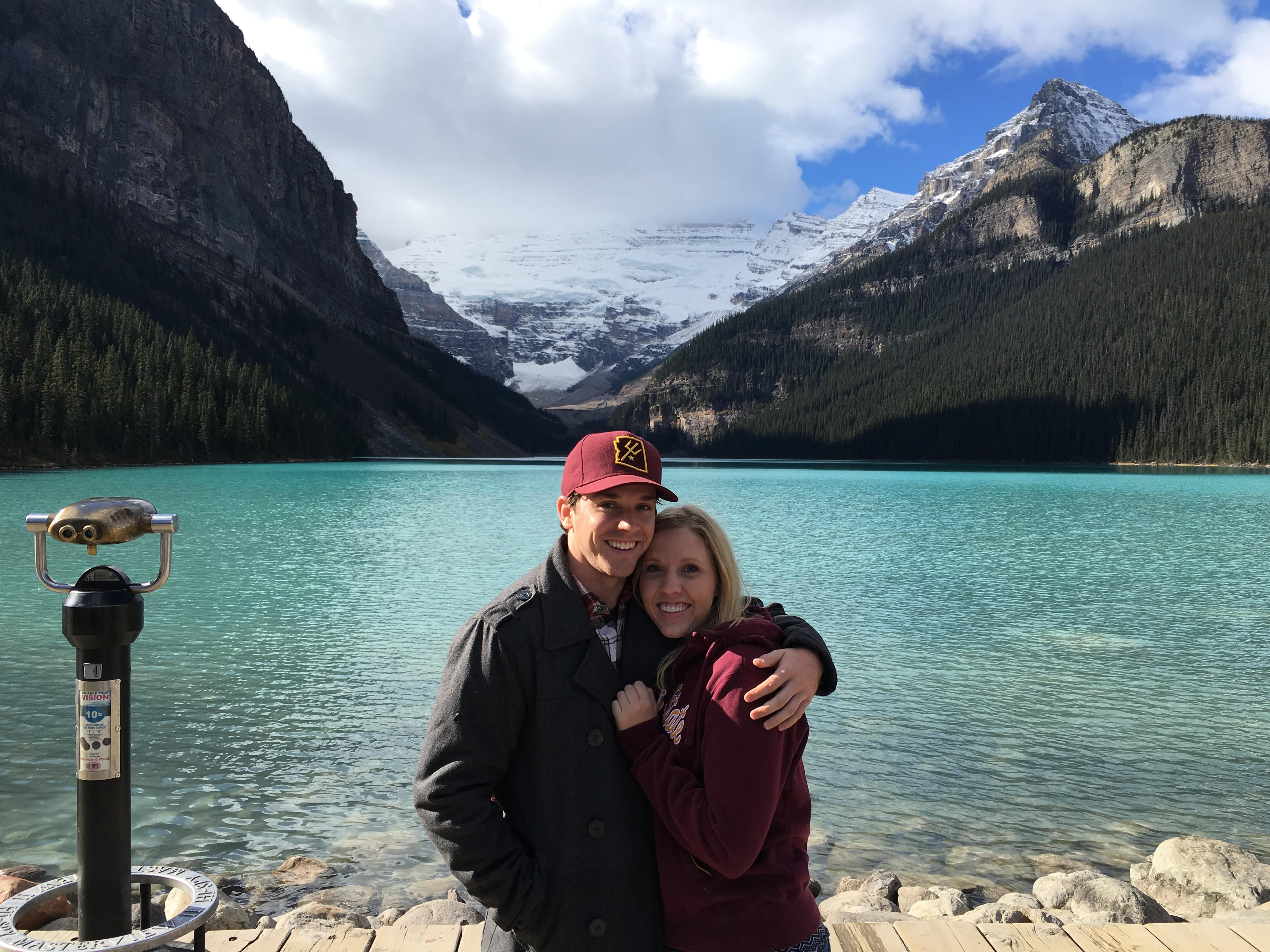 Couple posing on a lakeside