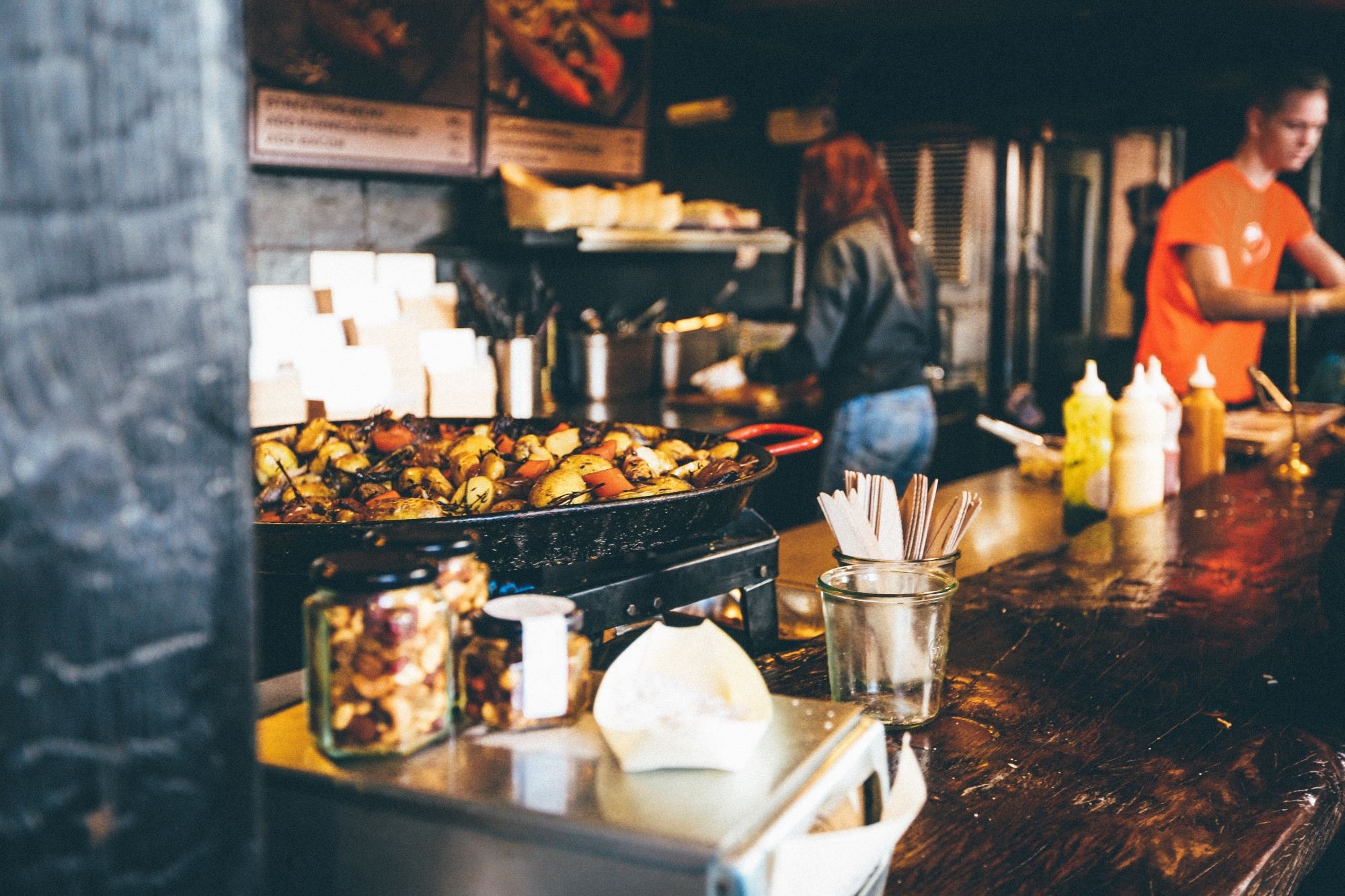 Person cooking in the kitchen.