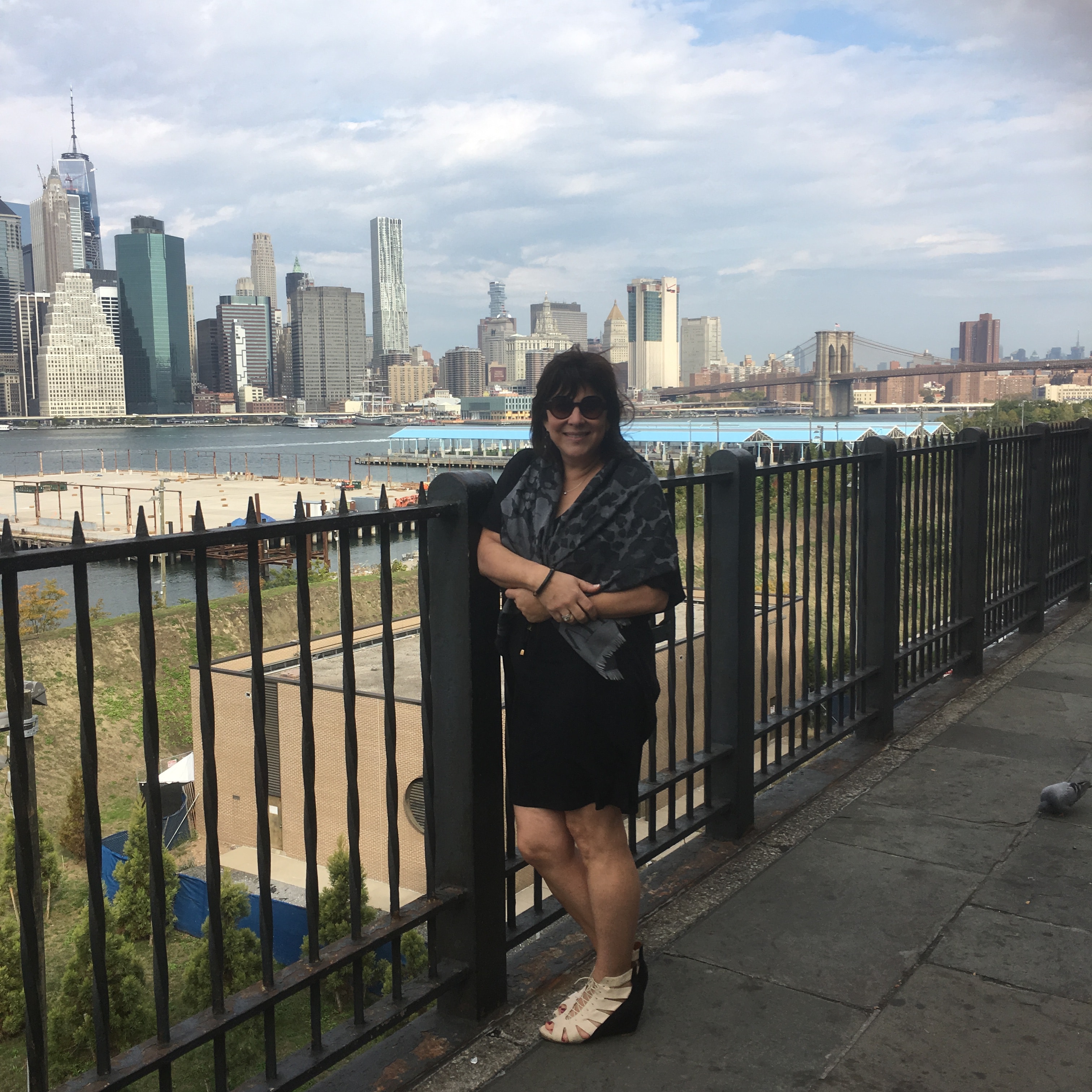 standing on a balcony