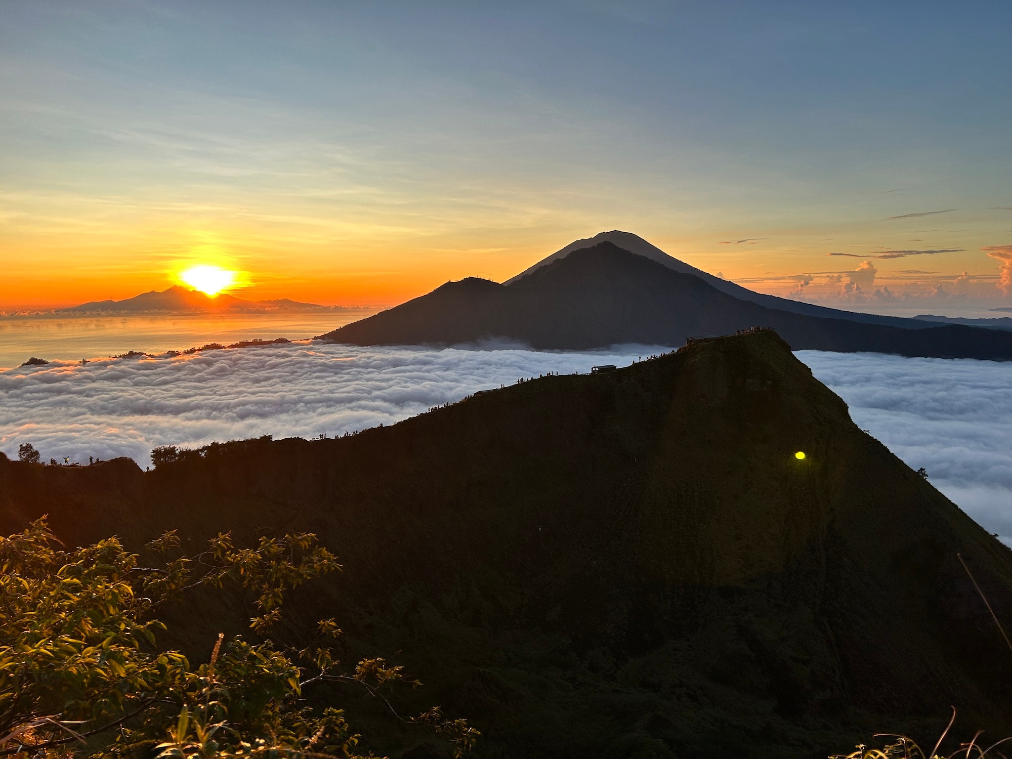 Sunrise at mountain with clouds in front. 