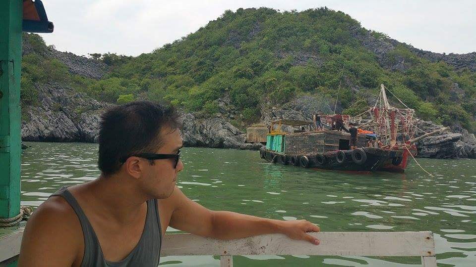 Travel advisor posing on a lakeside