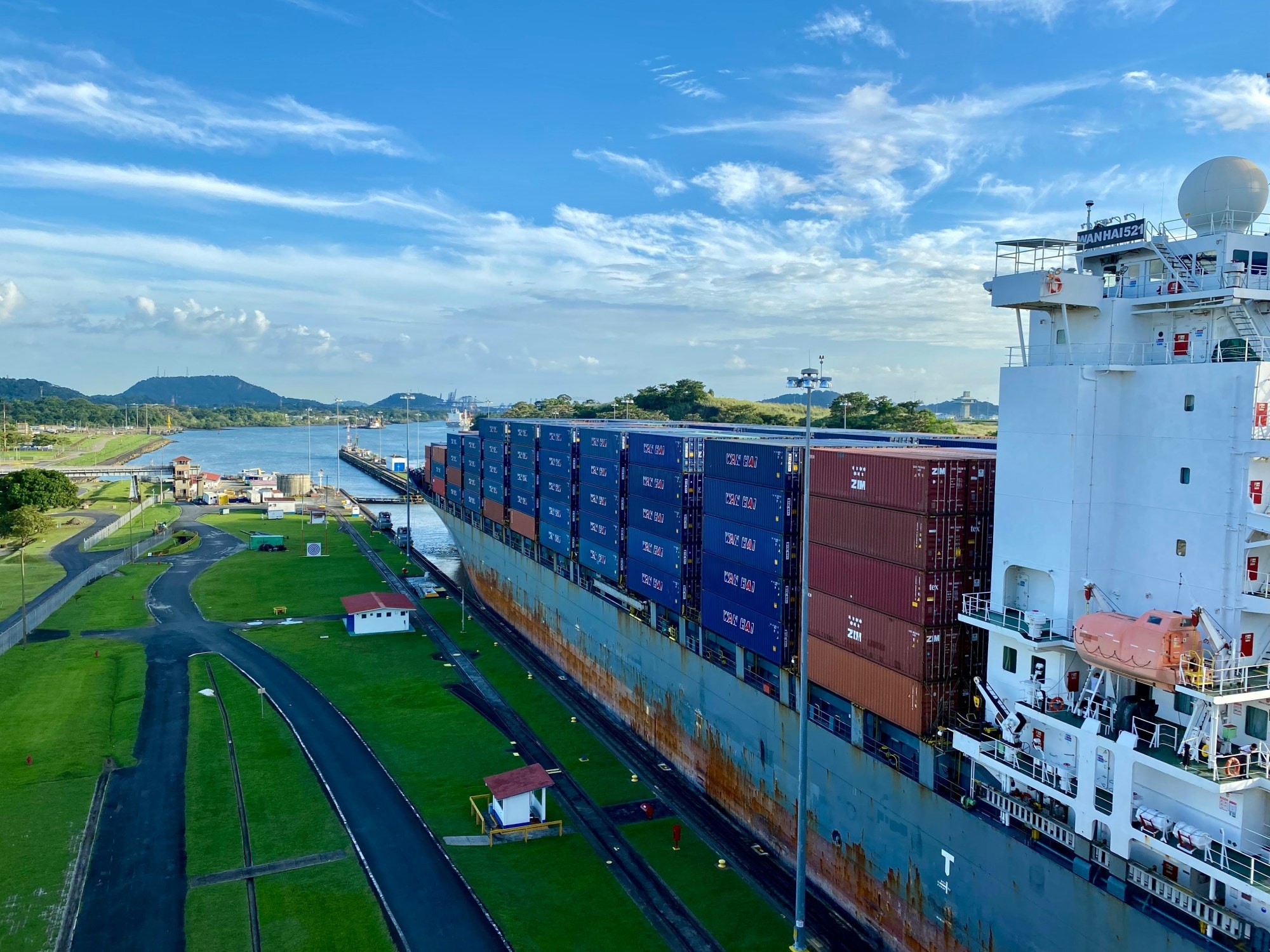 A large cargo ship in a body of water.