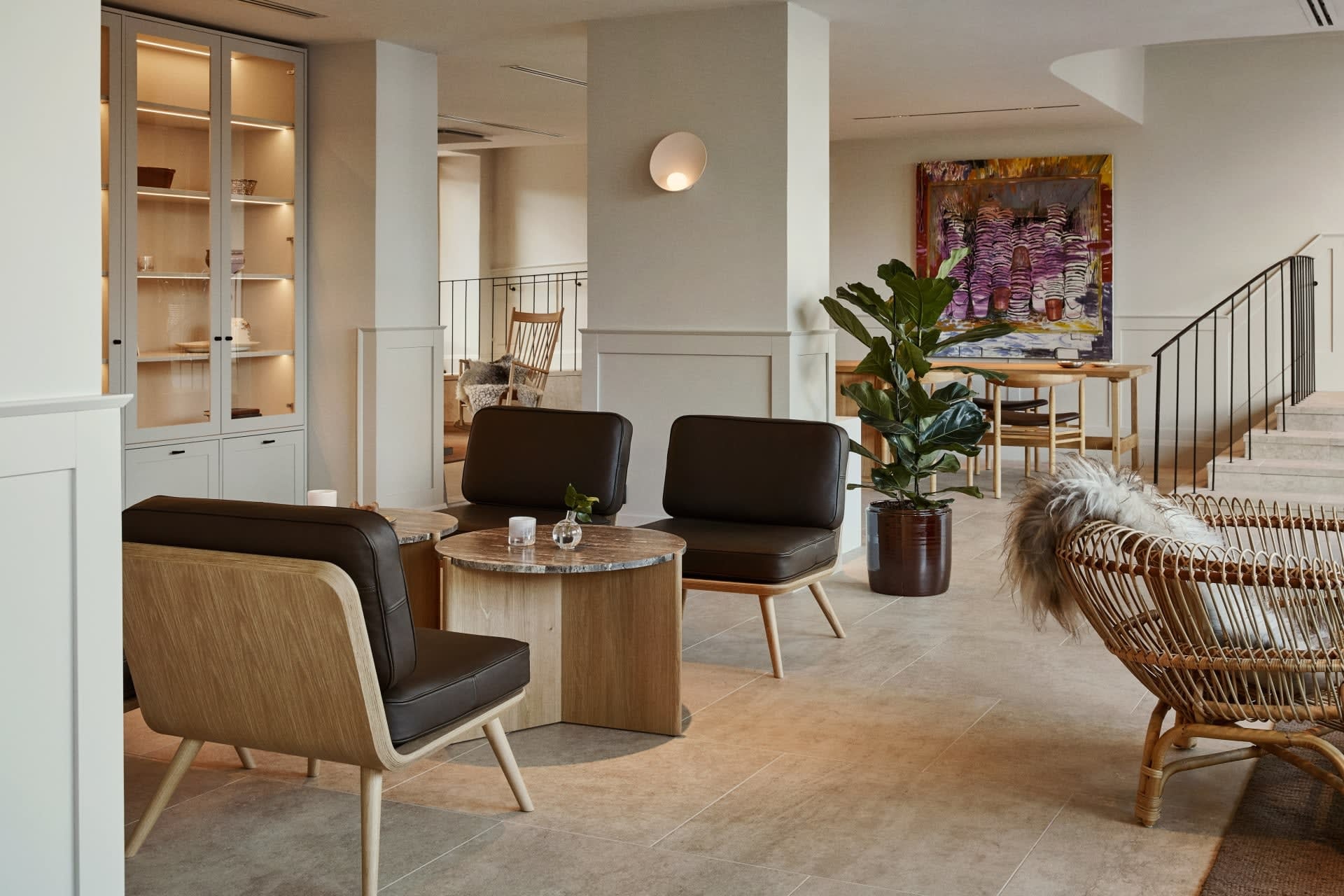 a luxe hotel lobby with sleek, Scandinavian minimalist furniture