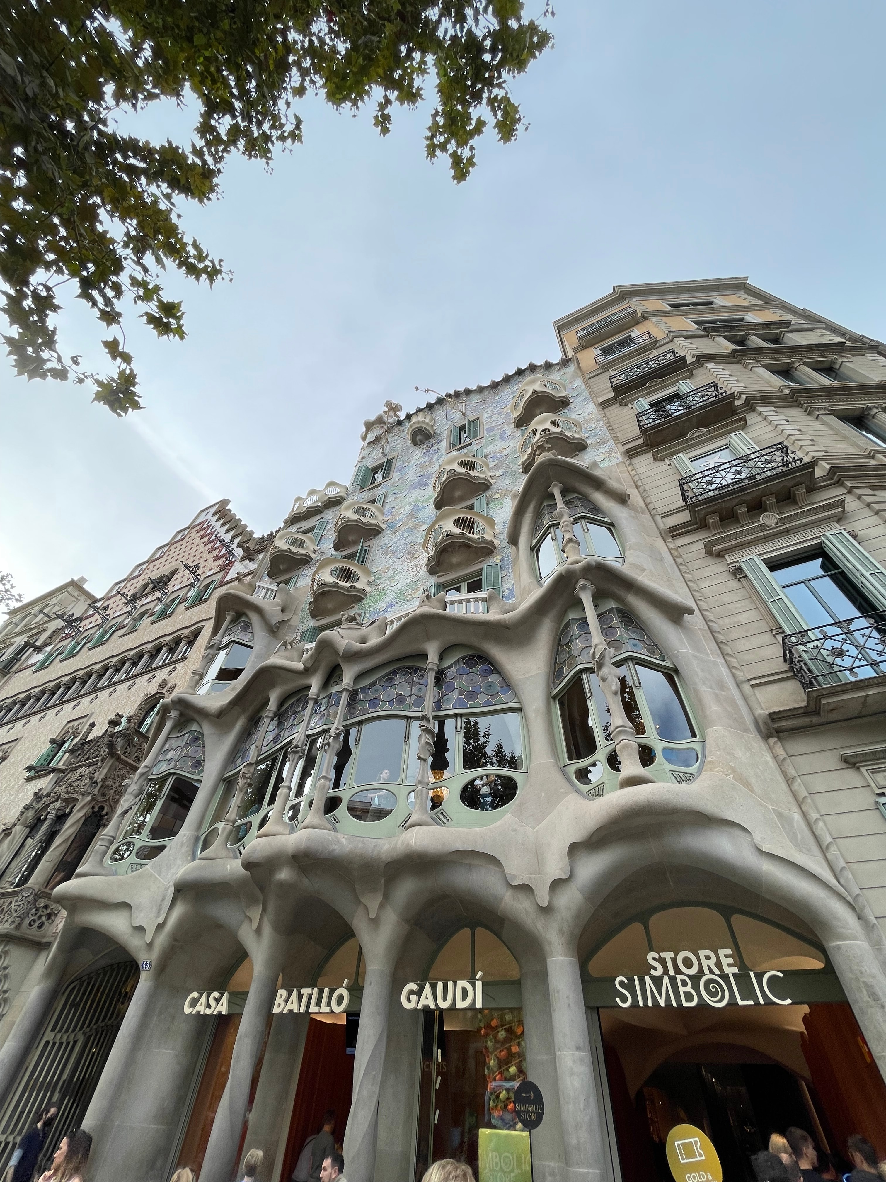 A view of a building exterior from the bottom up. 