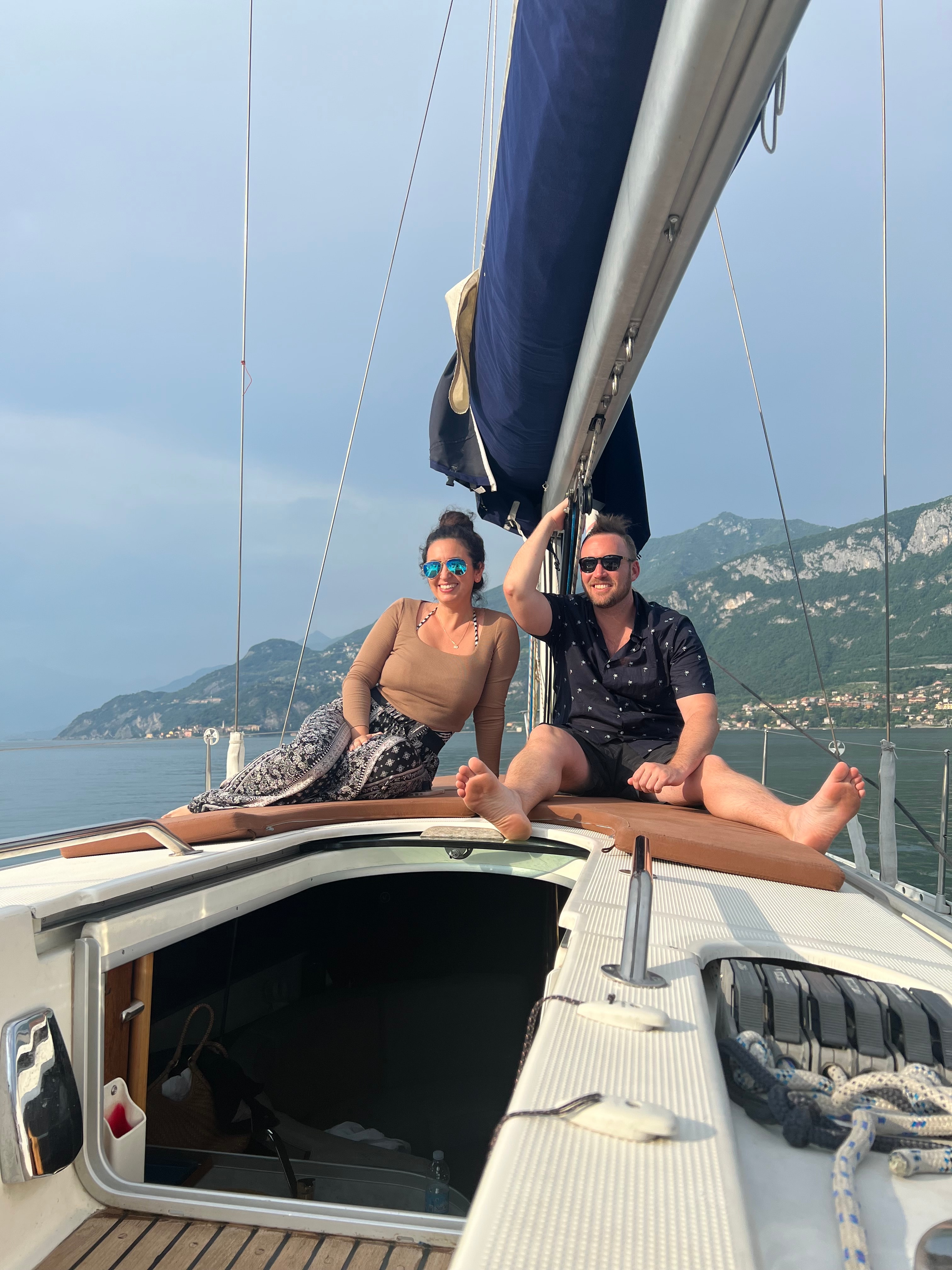 Advisor posing on a sail boat on a sunny day. 