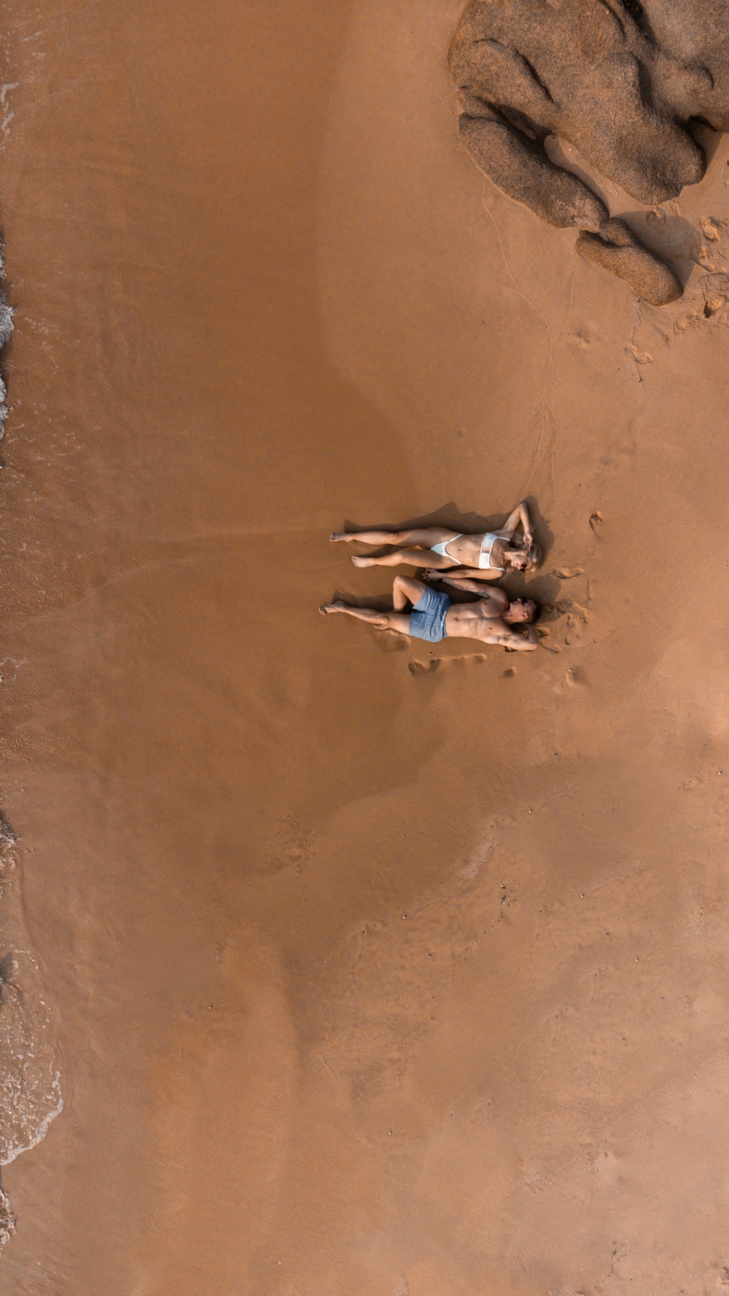 A view of people relaxing on the beach 