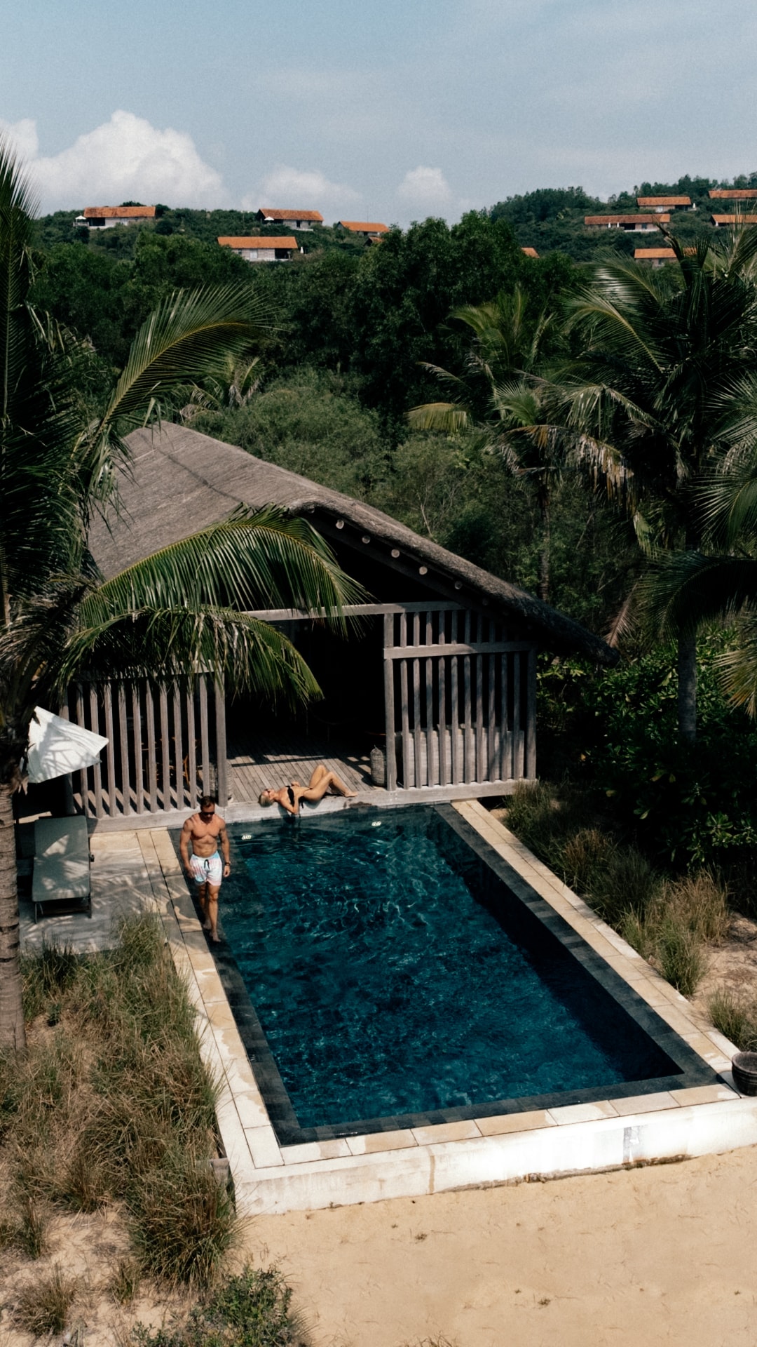 A view of a swimming pool during the daytime.