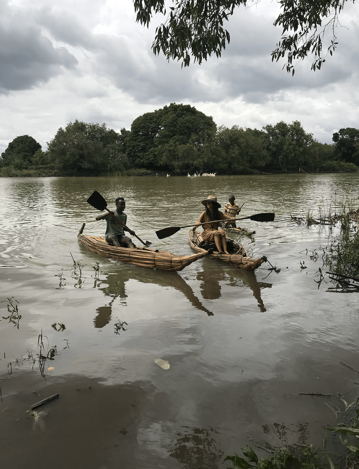 Boats on river.