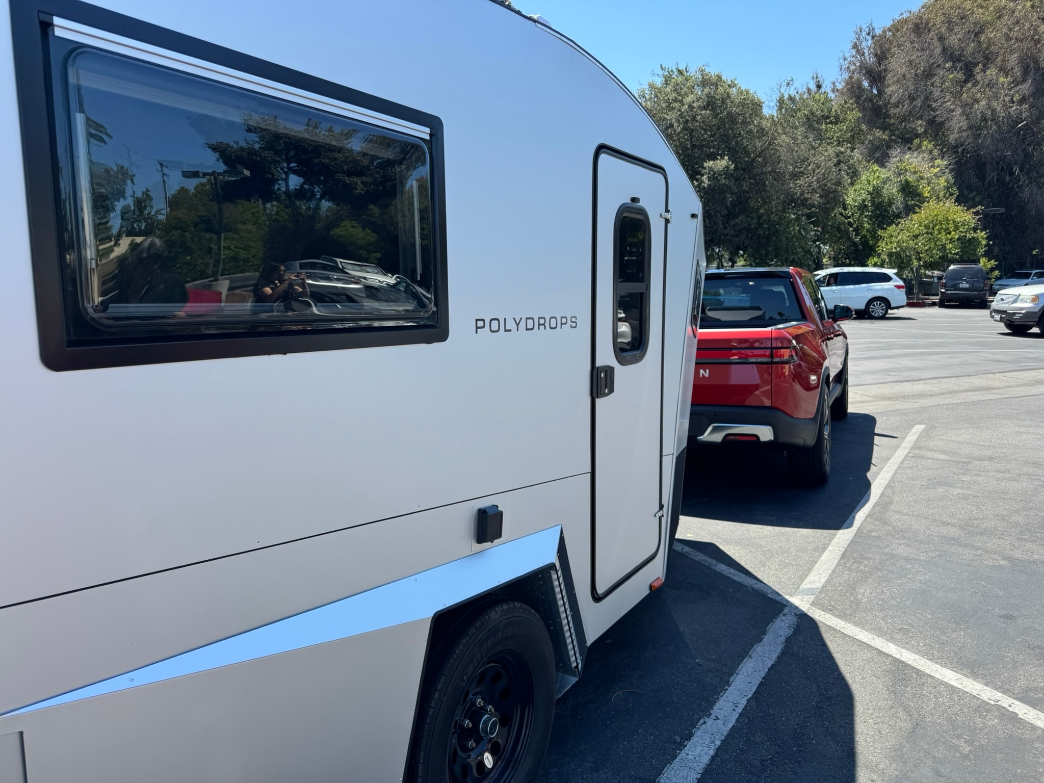 Side of an attached trailer wagon in a parking lot