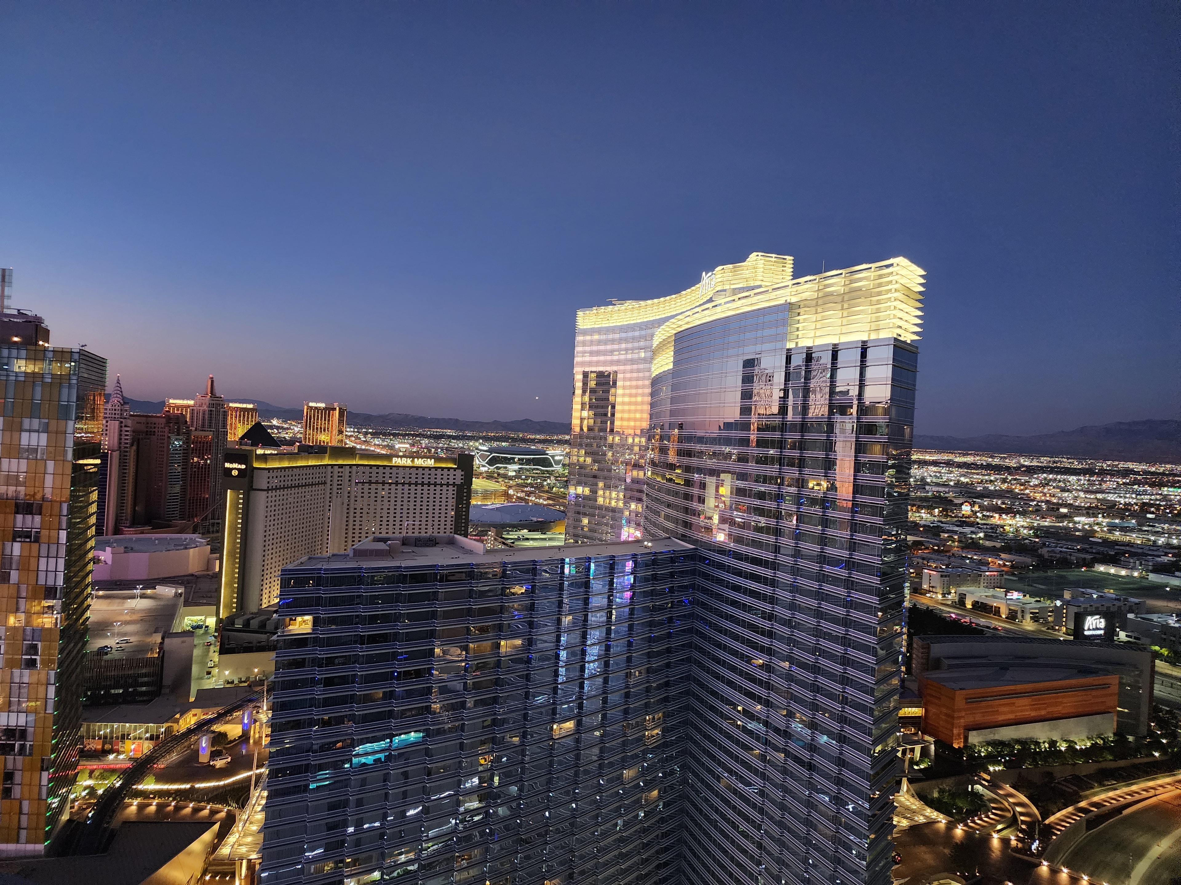 A view of a city at dusk. 