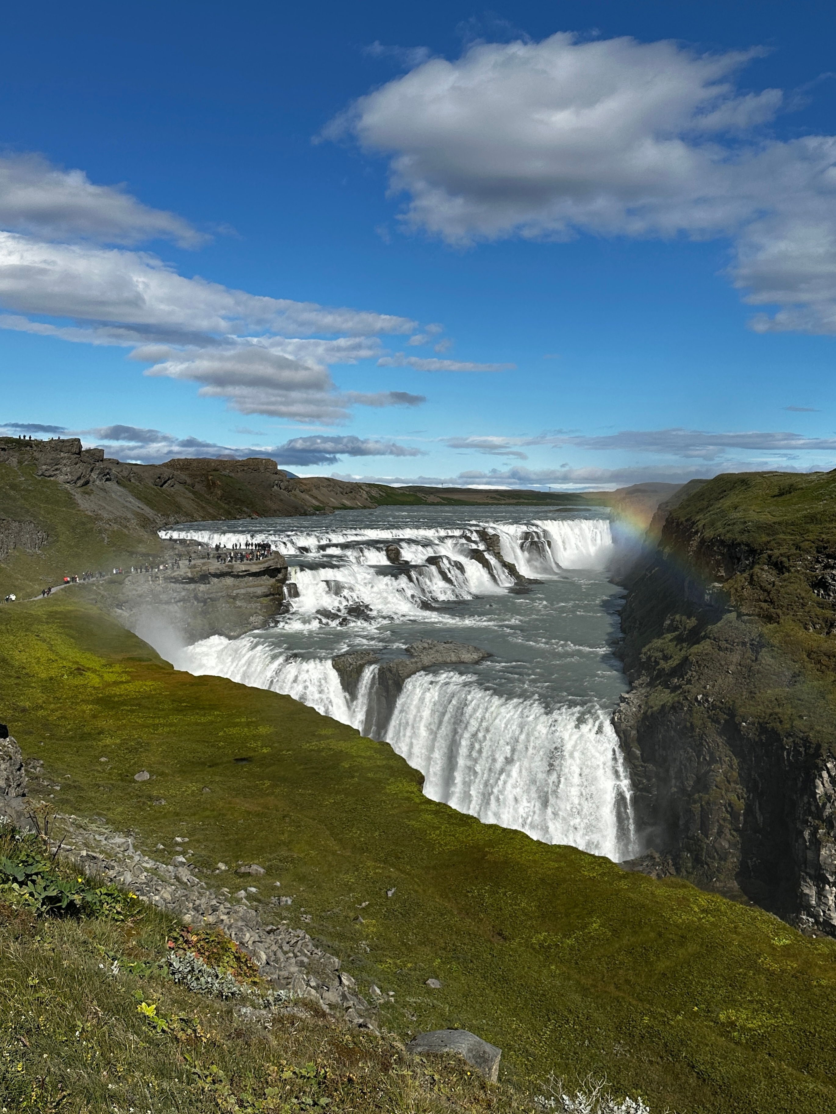 Beautiful view of a massive waterfall on a sunny day