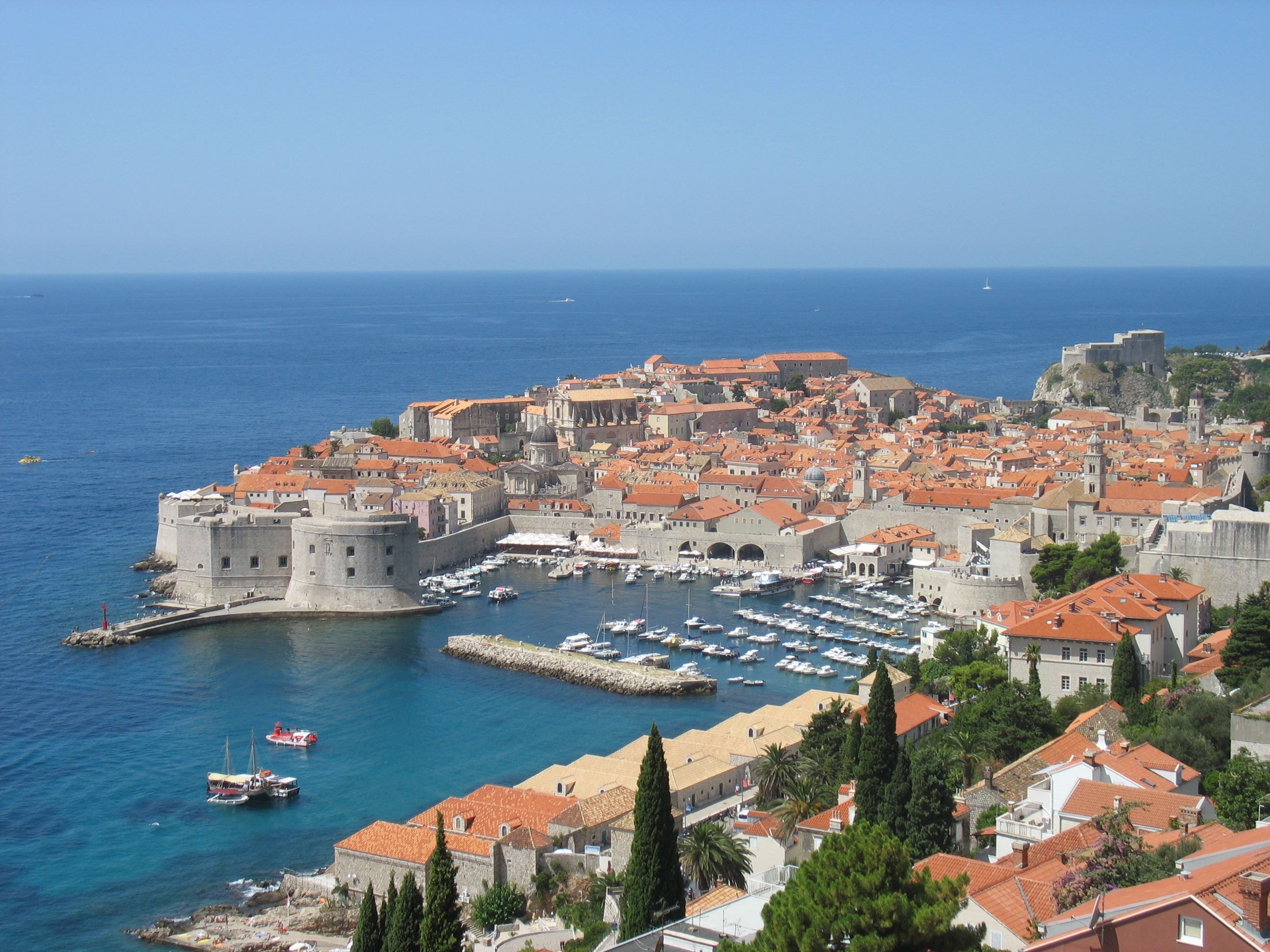 Aerial view of the port of Dubrovnik and Old City on a sunny day