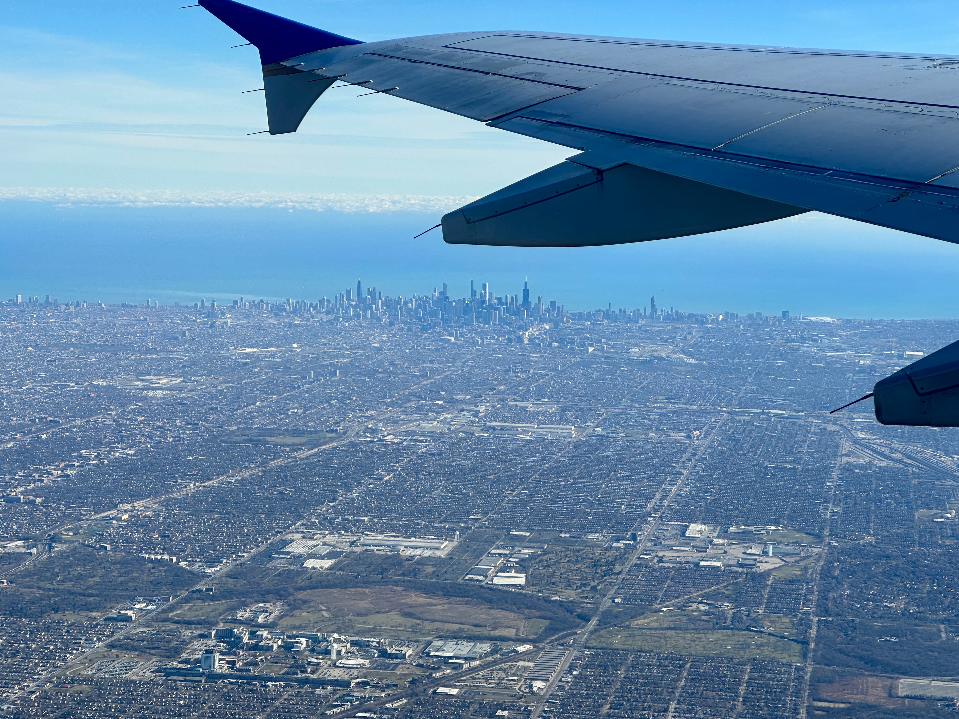 A view of a plane in flight from the window seat.