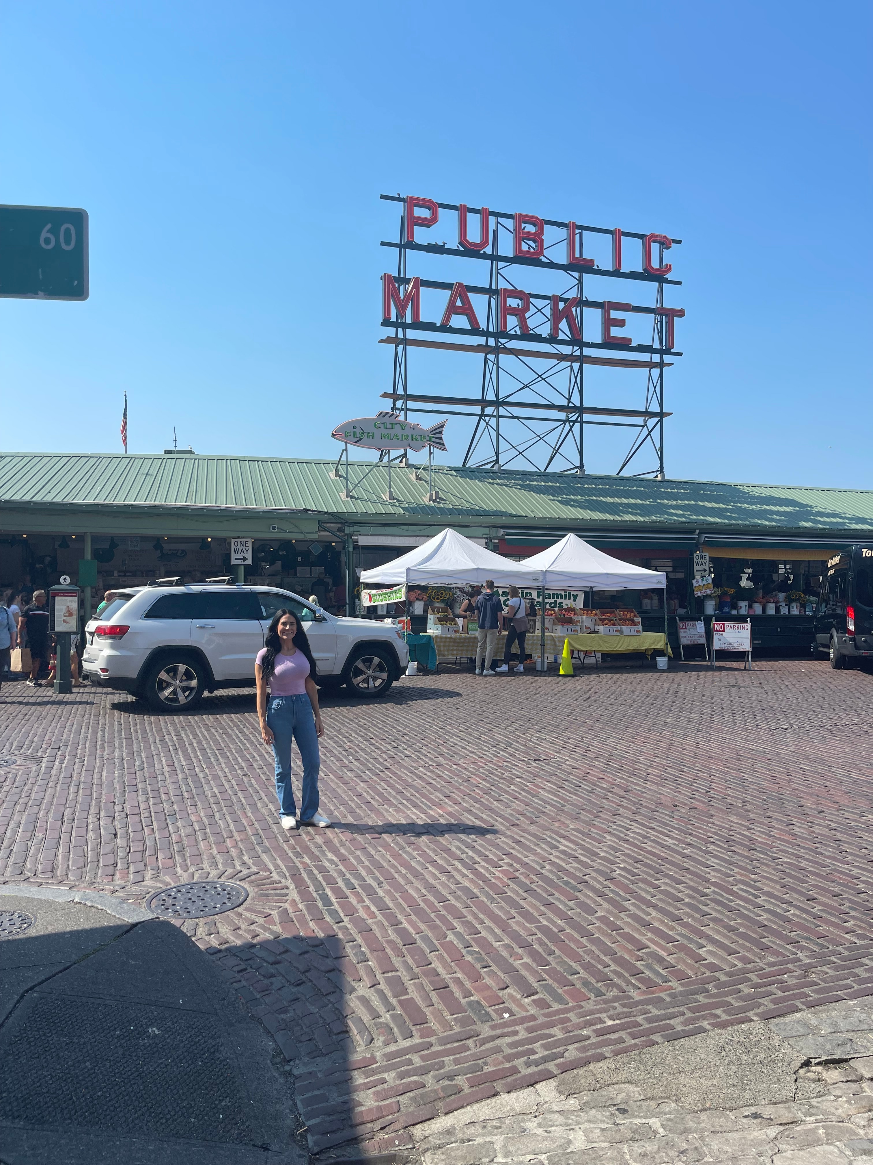 View of the Public Market sign in Seattle on a sunny day