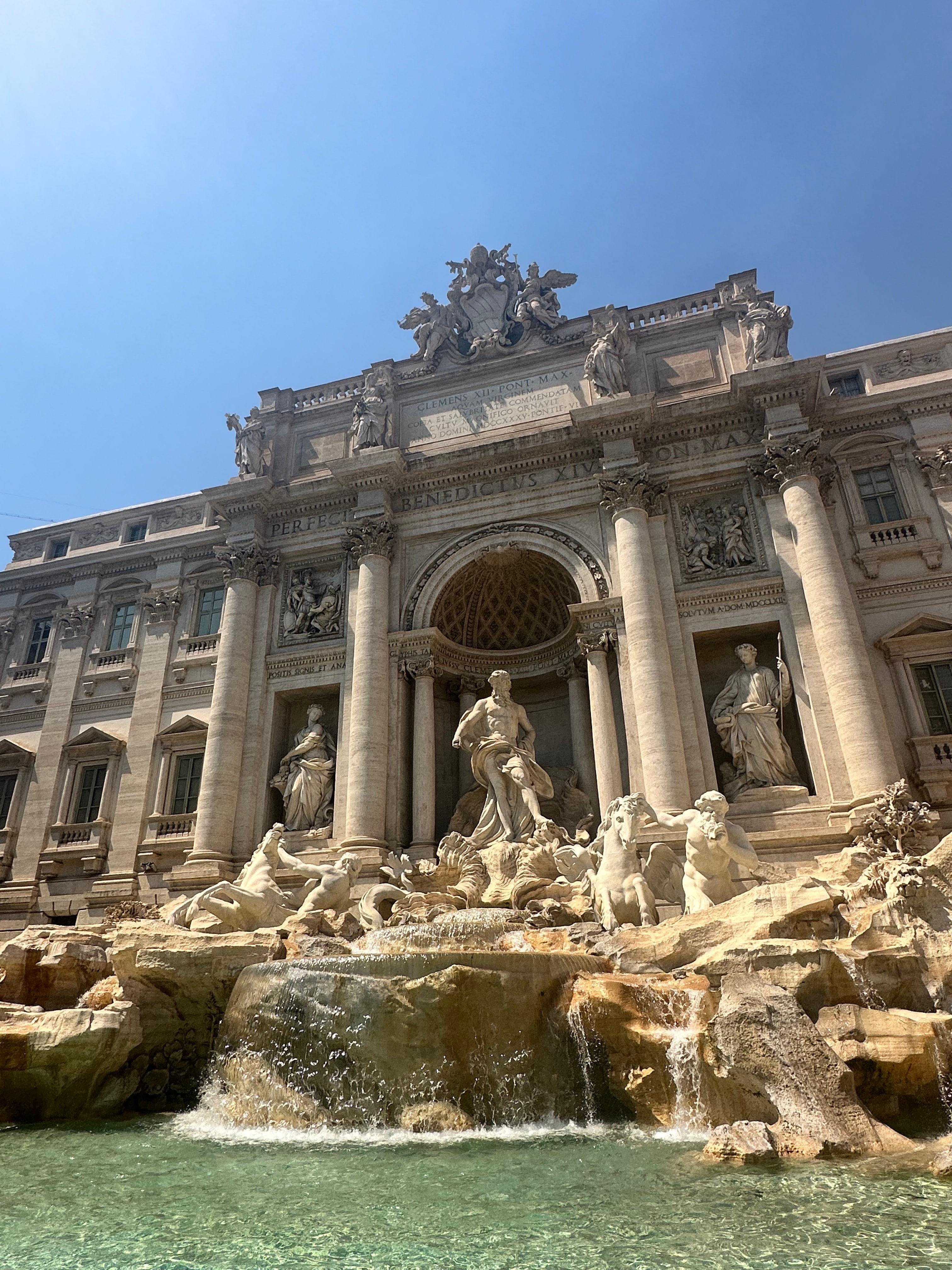 View of the Trevi Fountain in Rome on a sunny day