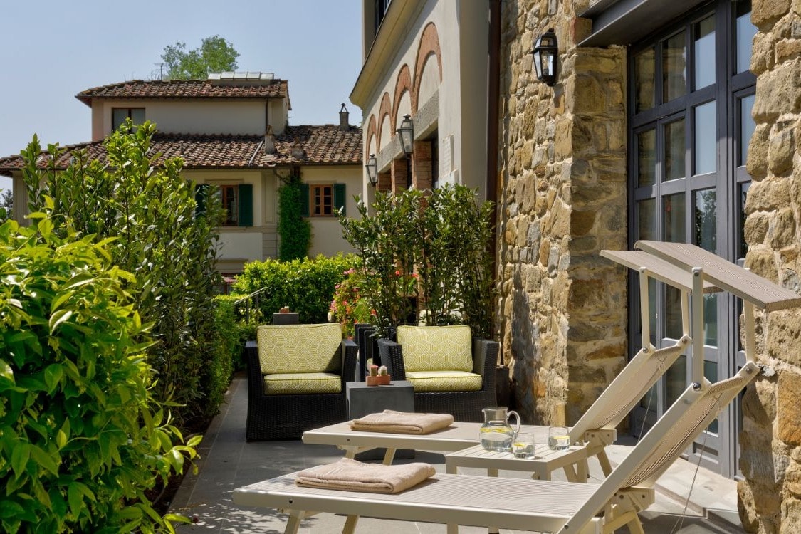 lounge chairs on a sunny Italian terrace