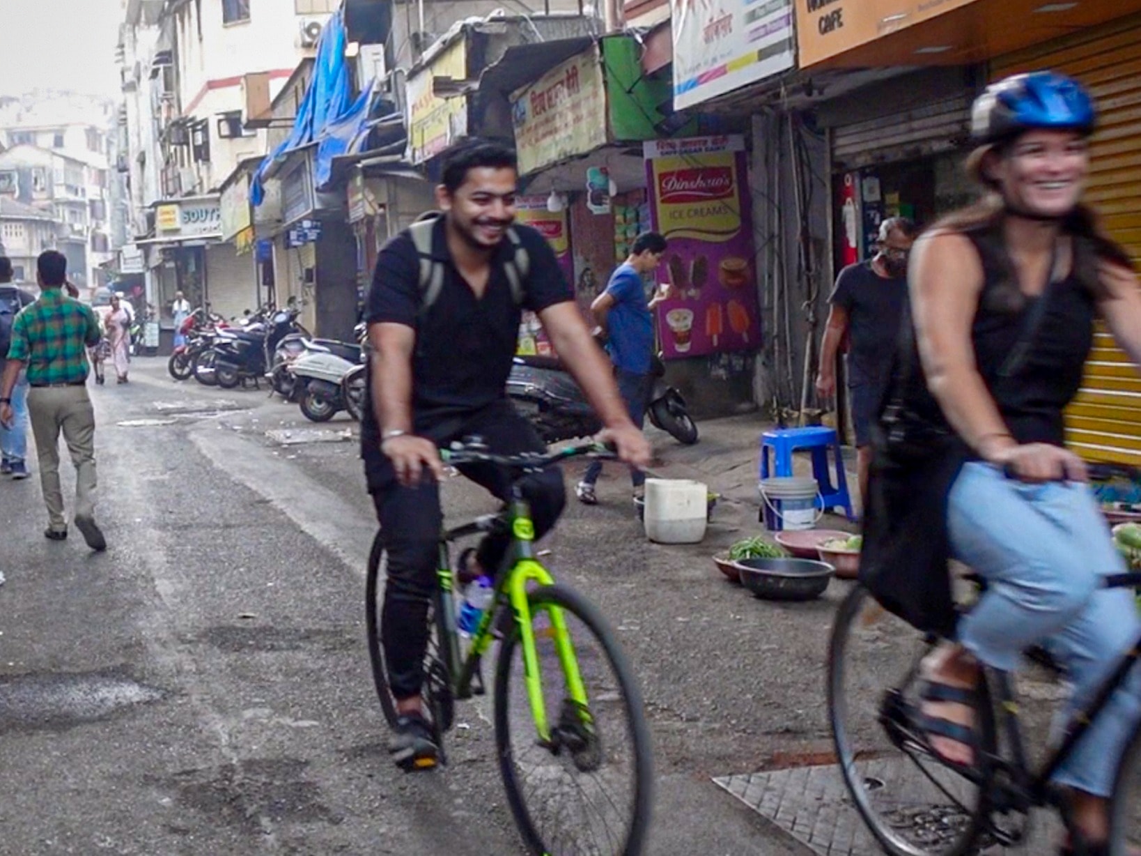 Cyclists on a busy street.