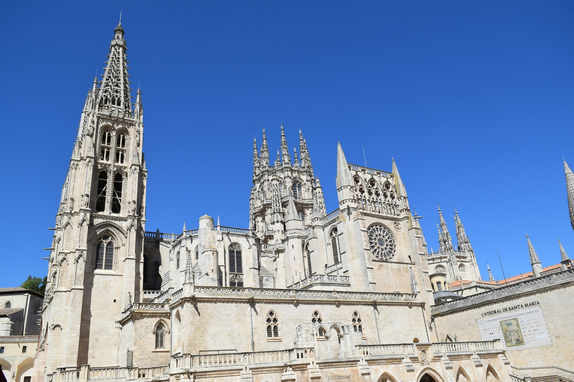 An ancient cathedral building under a blue sky