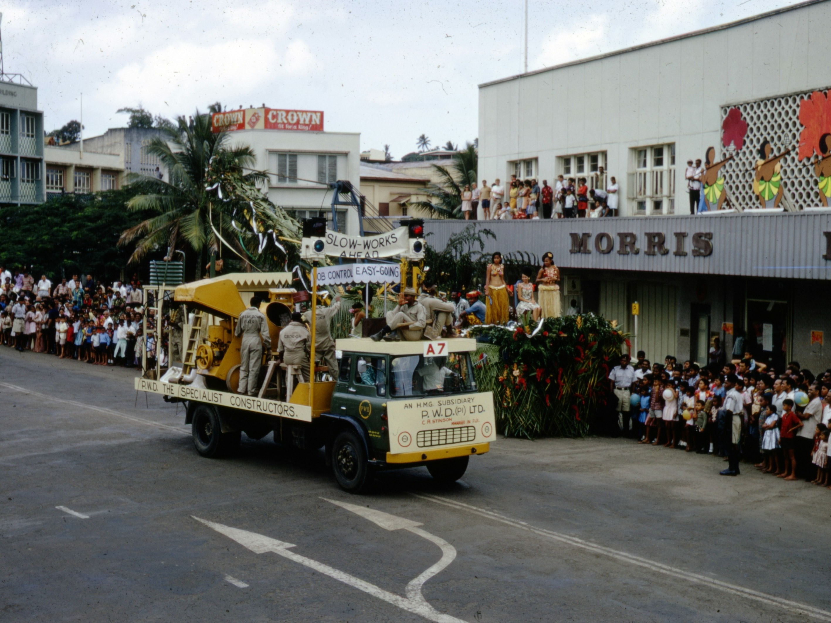 A bustling local market scene, alive with colorful stalls and eager shoppers.