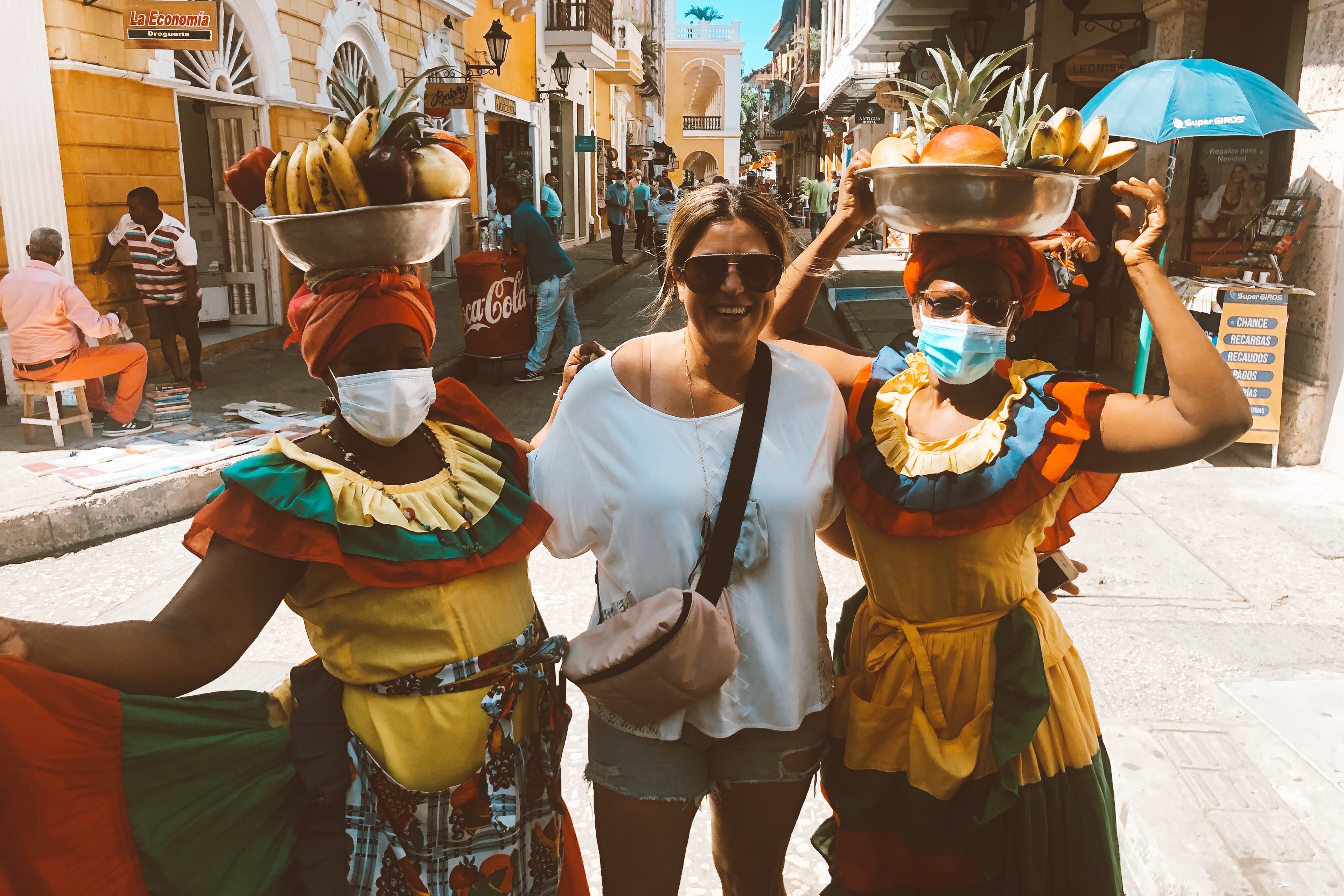 Advisor's photo with the fruit ladies of Cartagena's Walled City.