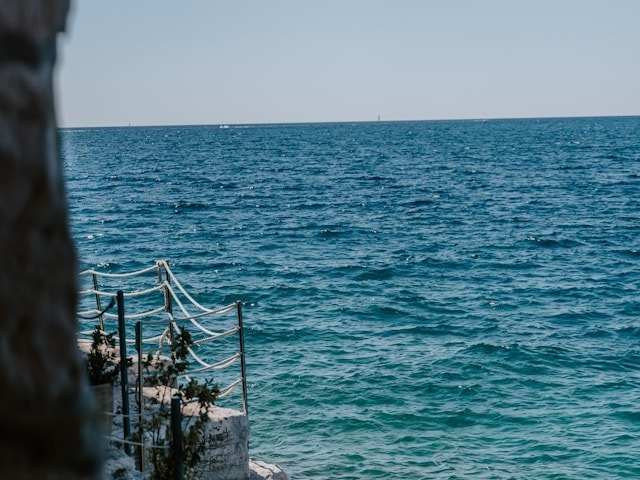 A stunning view of the sparkling, deep, blue, Adriatic Sea on a sunny day.