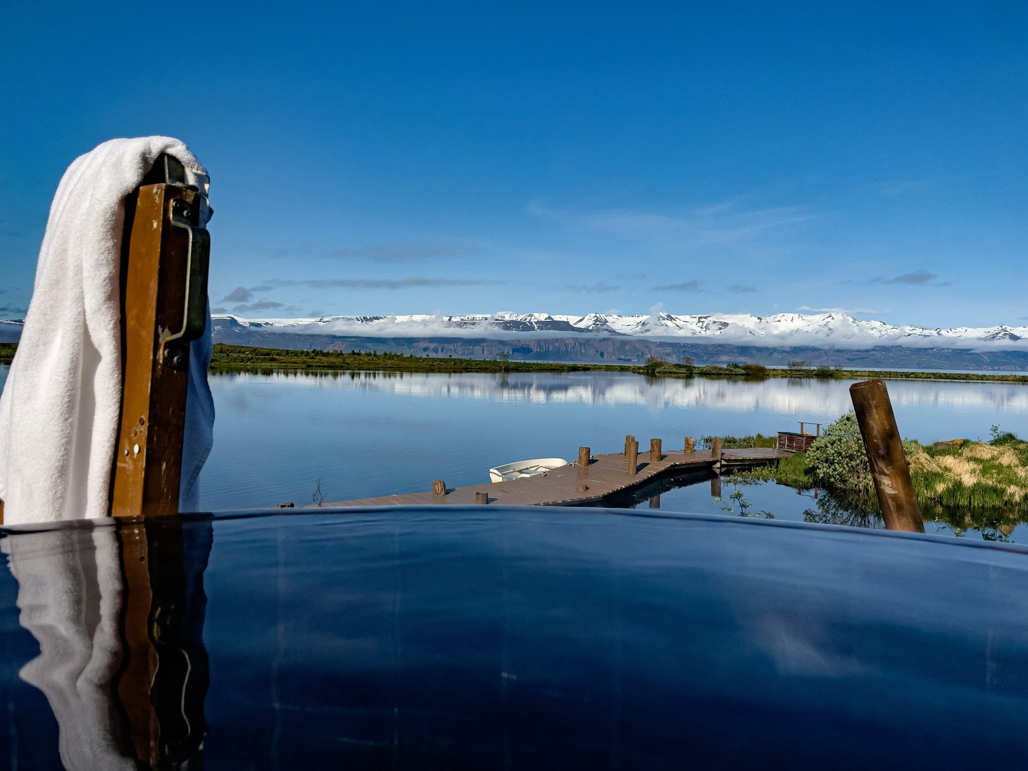 Pool with view of mountain range.