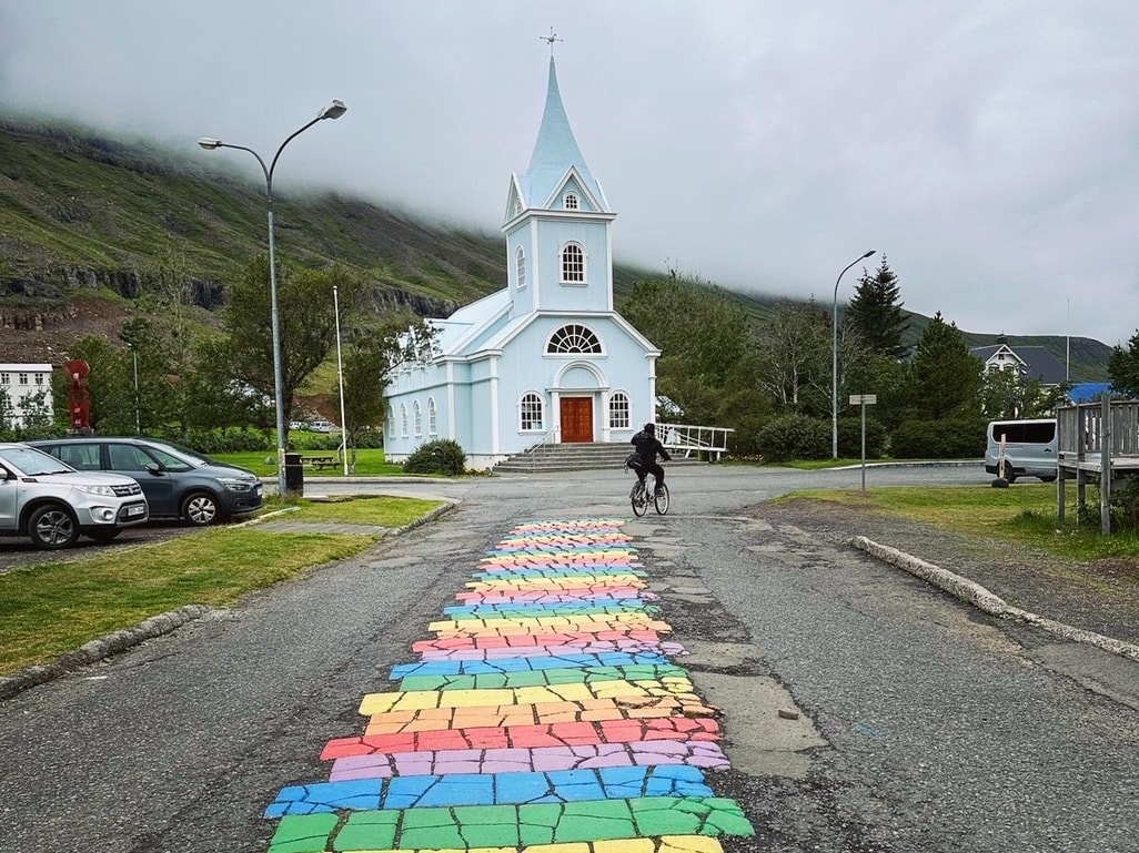 Colorful path leading to a church.