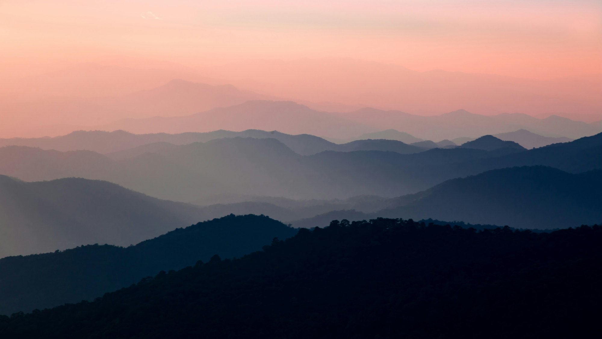 Orange hour over mountains.