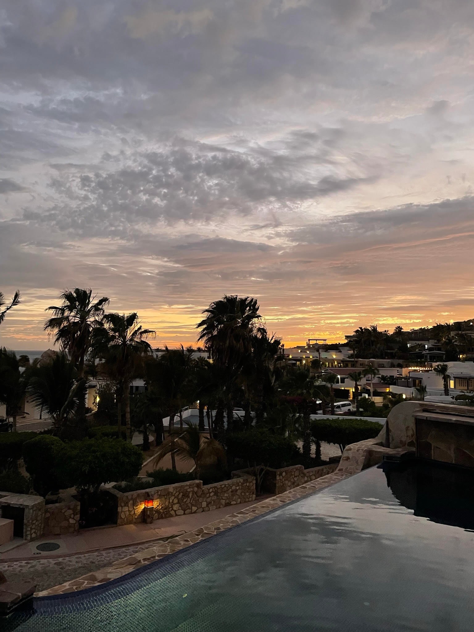 Beautiful view of the pool at sunset