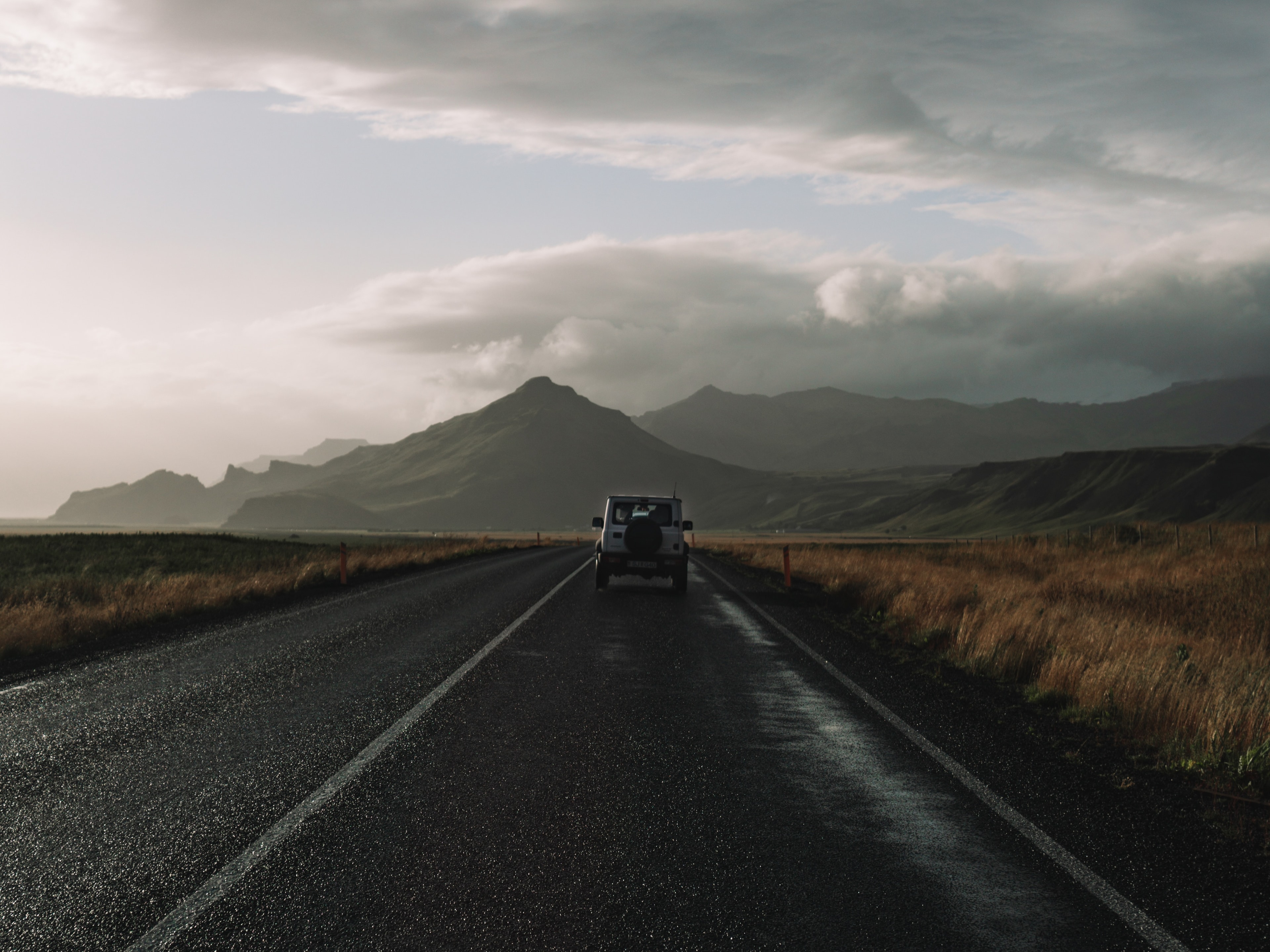 A car on a road at nighttime