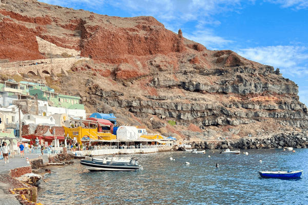 The harbor of an island with boats in the water