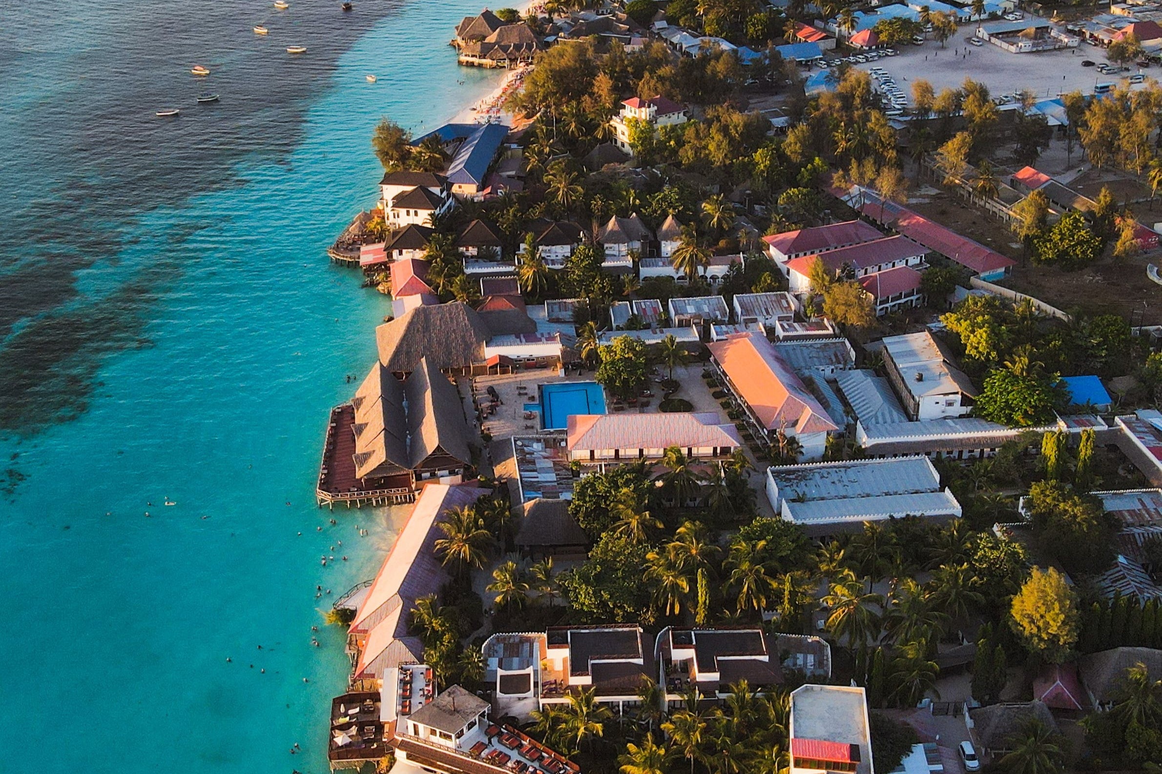 Aerial view of a town next to a body of water