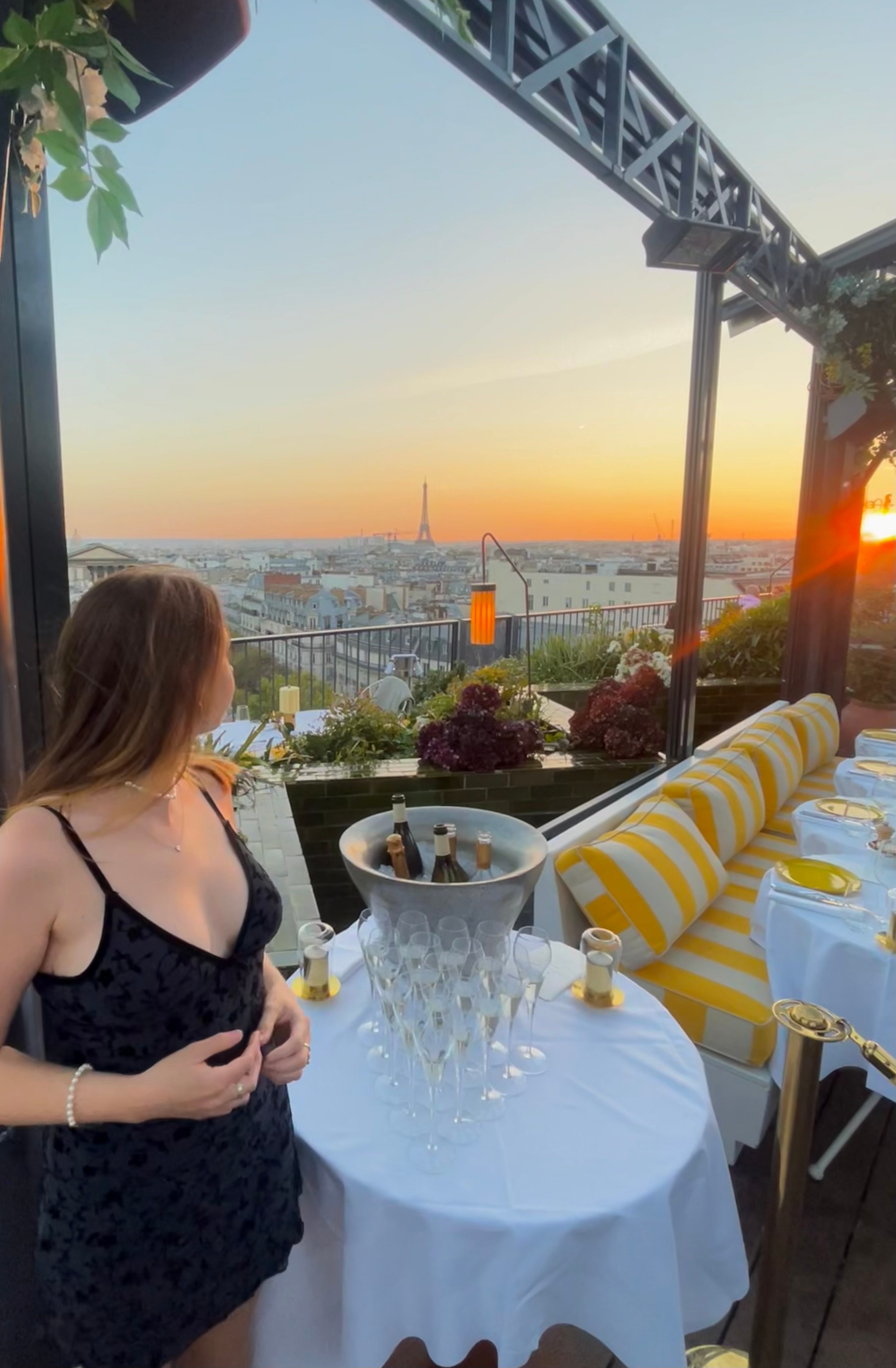 Picture of Georgia at a rooftop restaurant enjying sunset