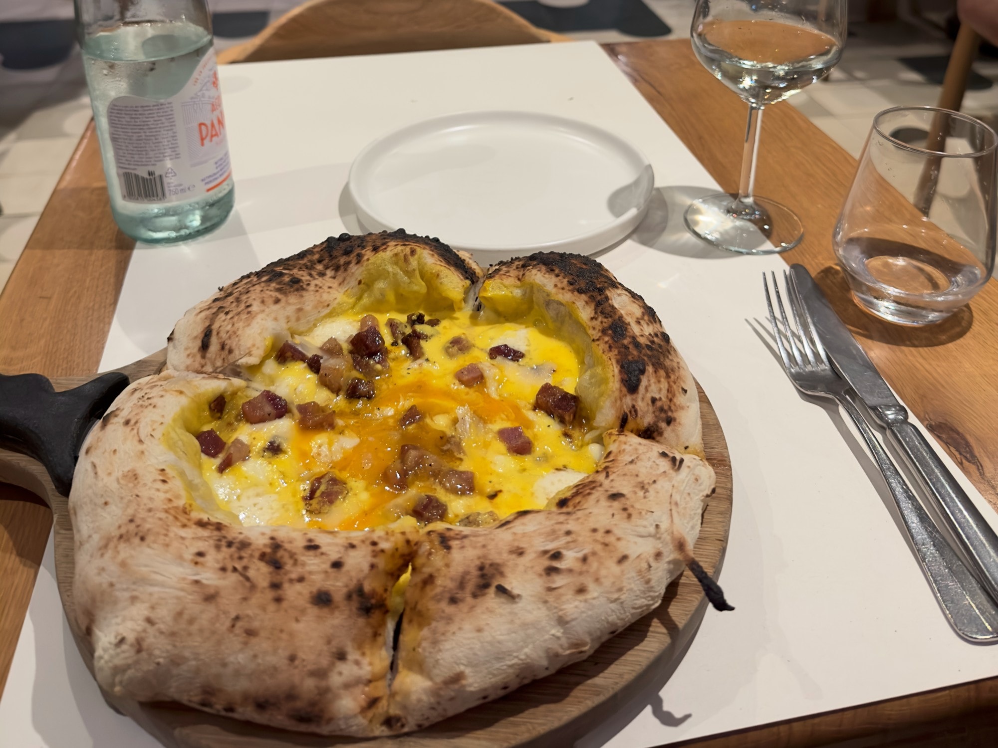 Pizza on a table in restaurant.