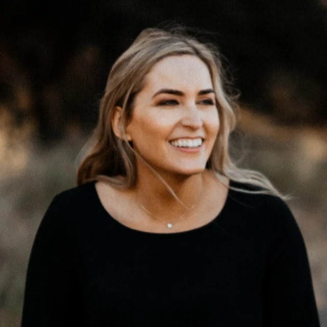 Amy's headshot in black dress