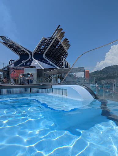Pool and futuristic structure behind.