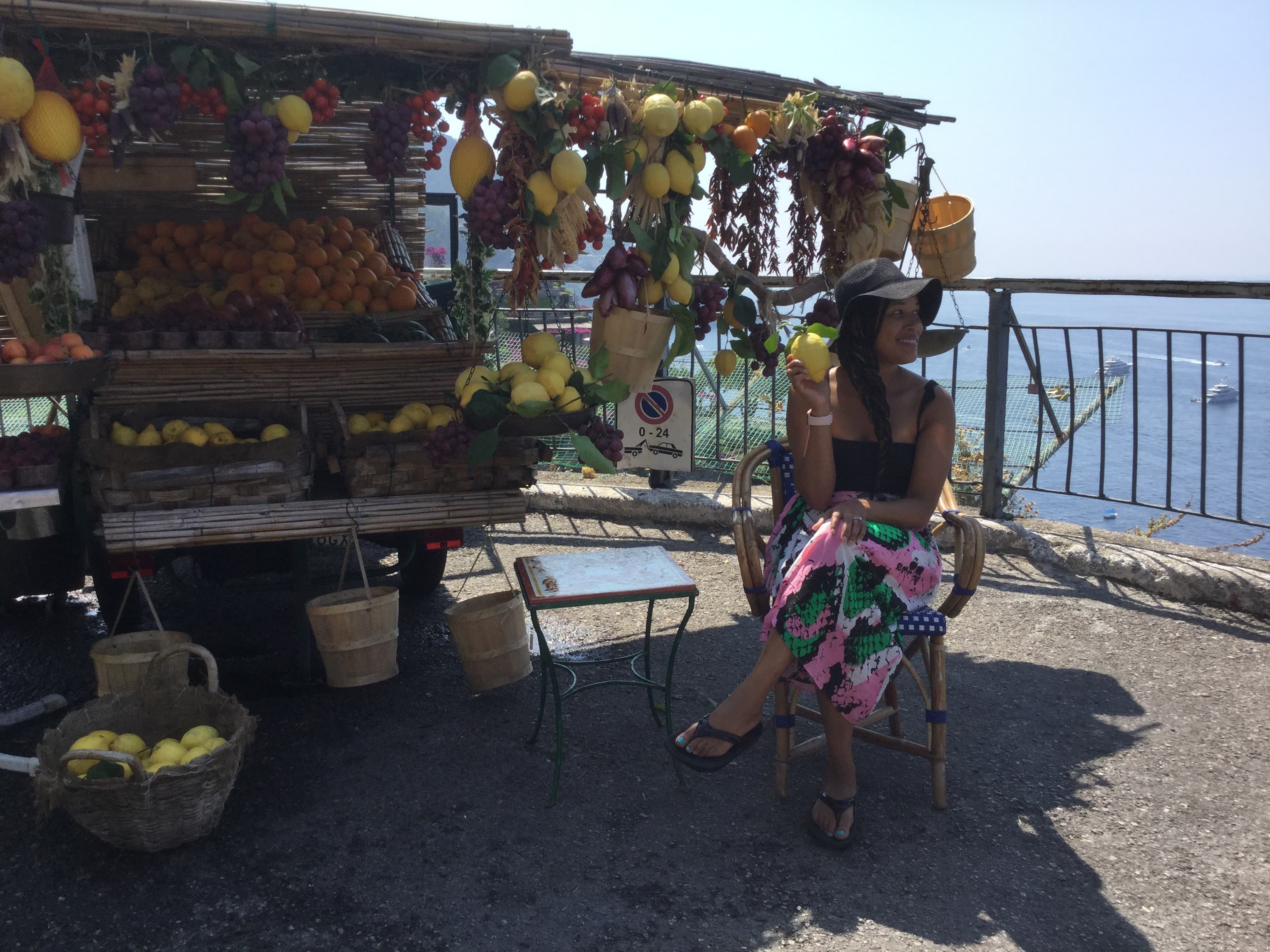 Travel advisor posing on sea side