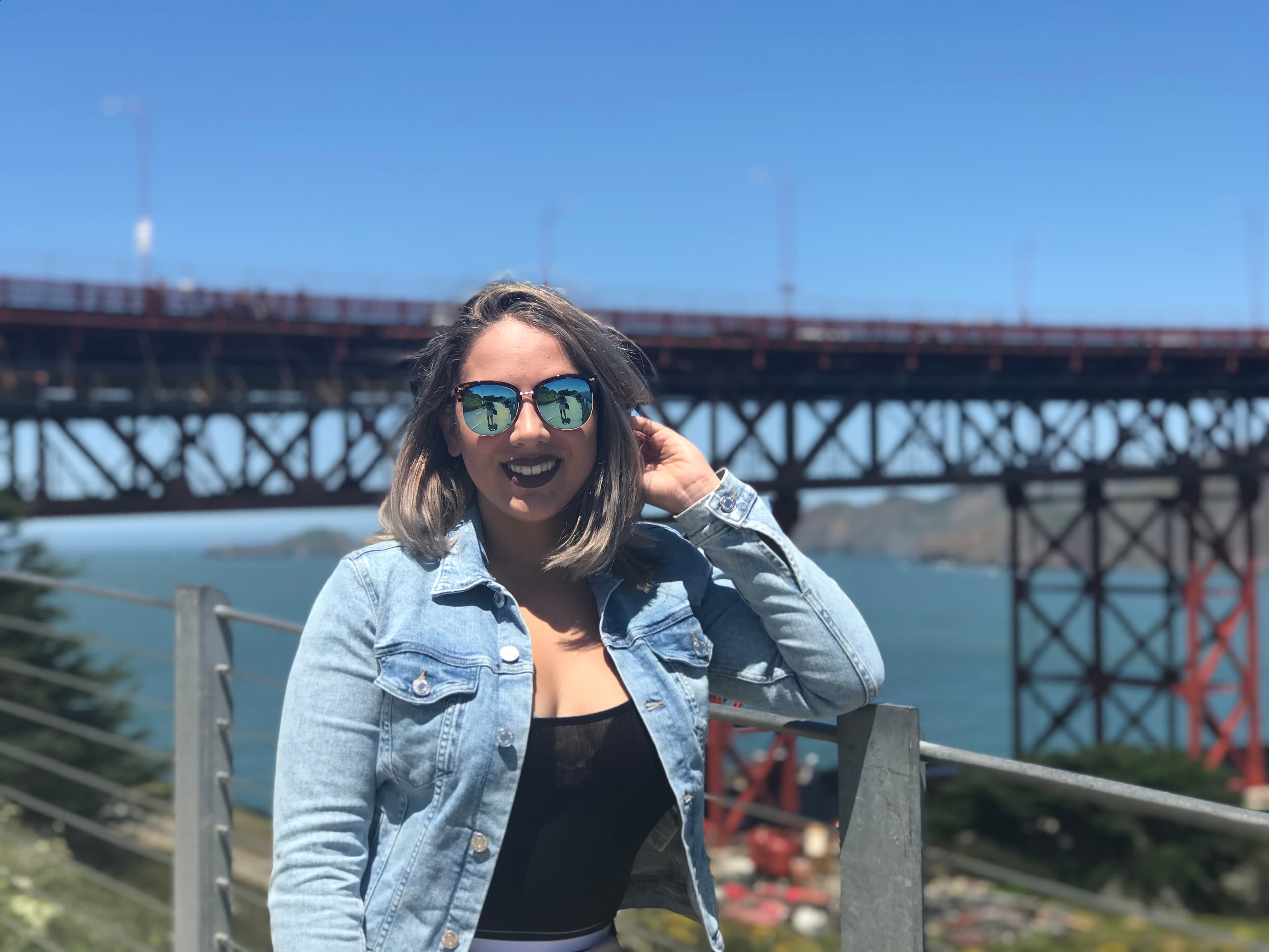 Picture of samira in Denim jacket and black top