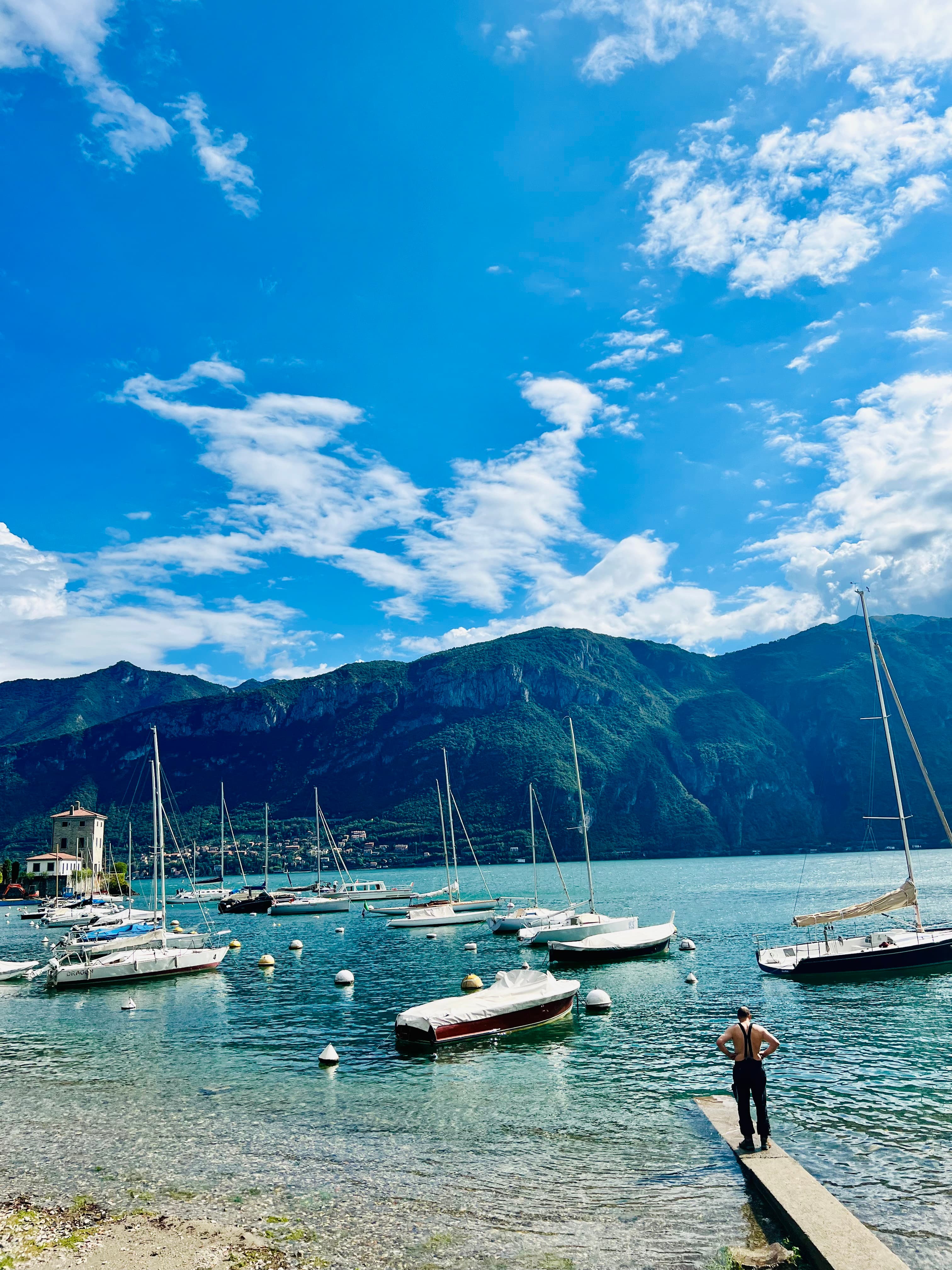Boats anchored on sea shore
