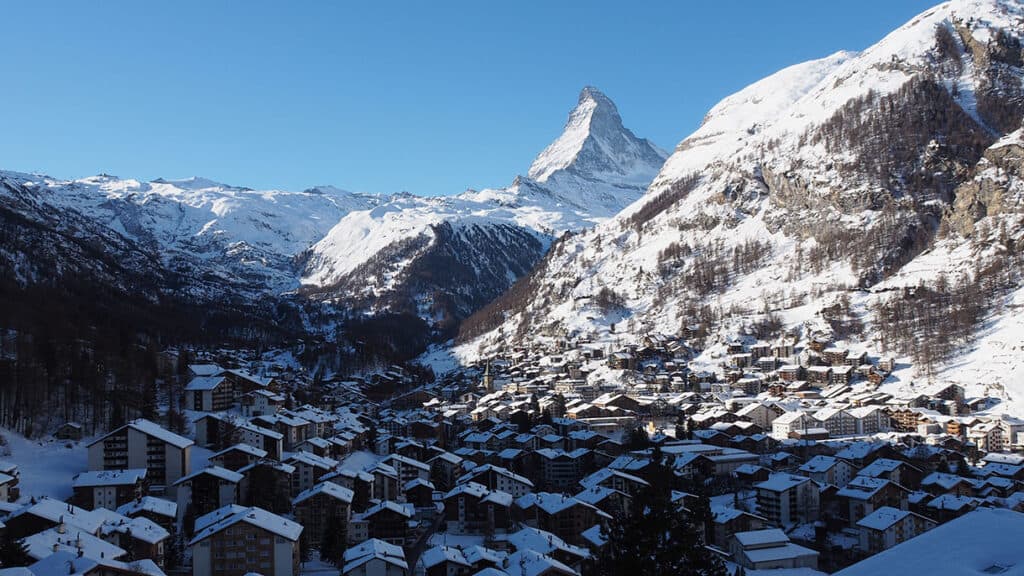 A snowy mountainside town.