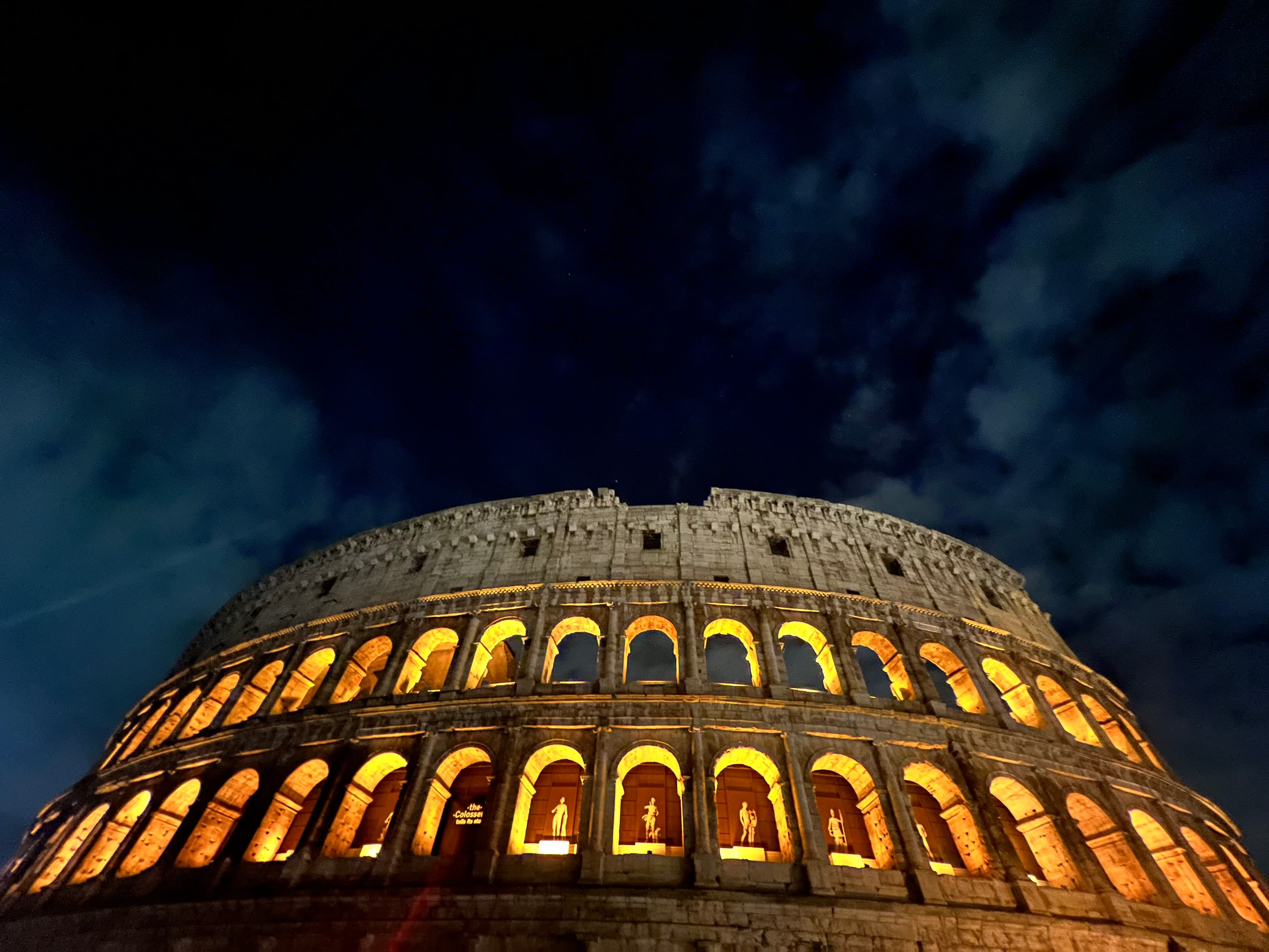 A beautiful view of the Roman Colosseum at night