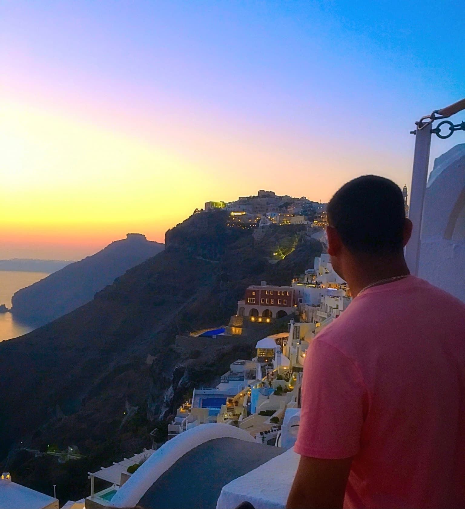 Looking at the beautiful view of Santorini