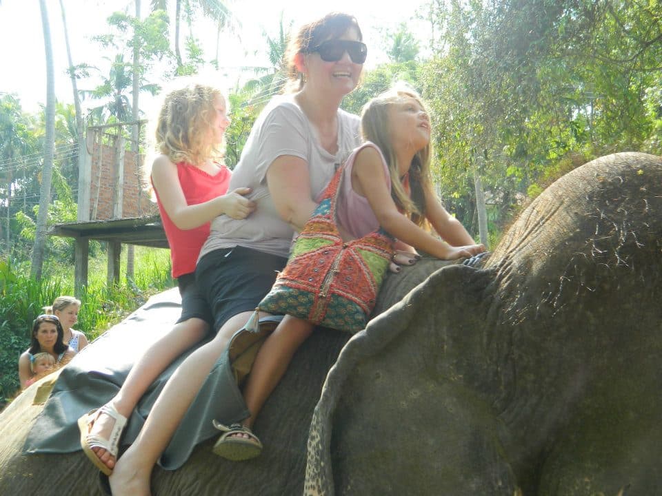 Kids of the back of an elephant