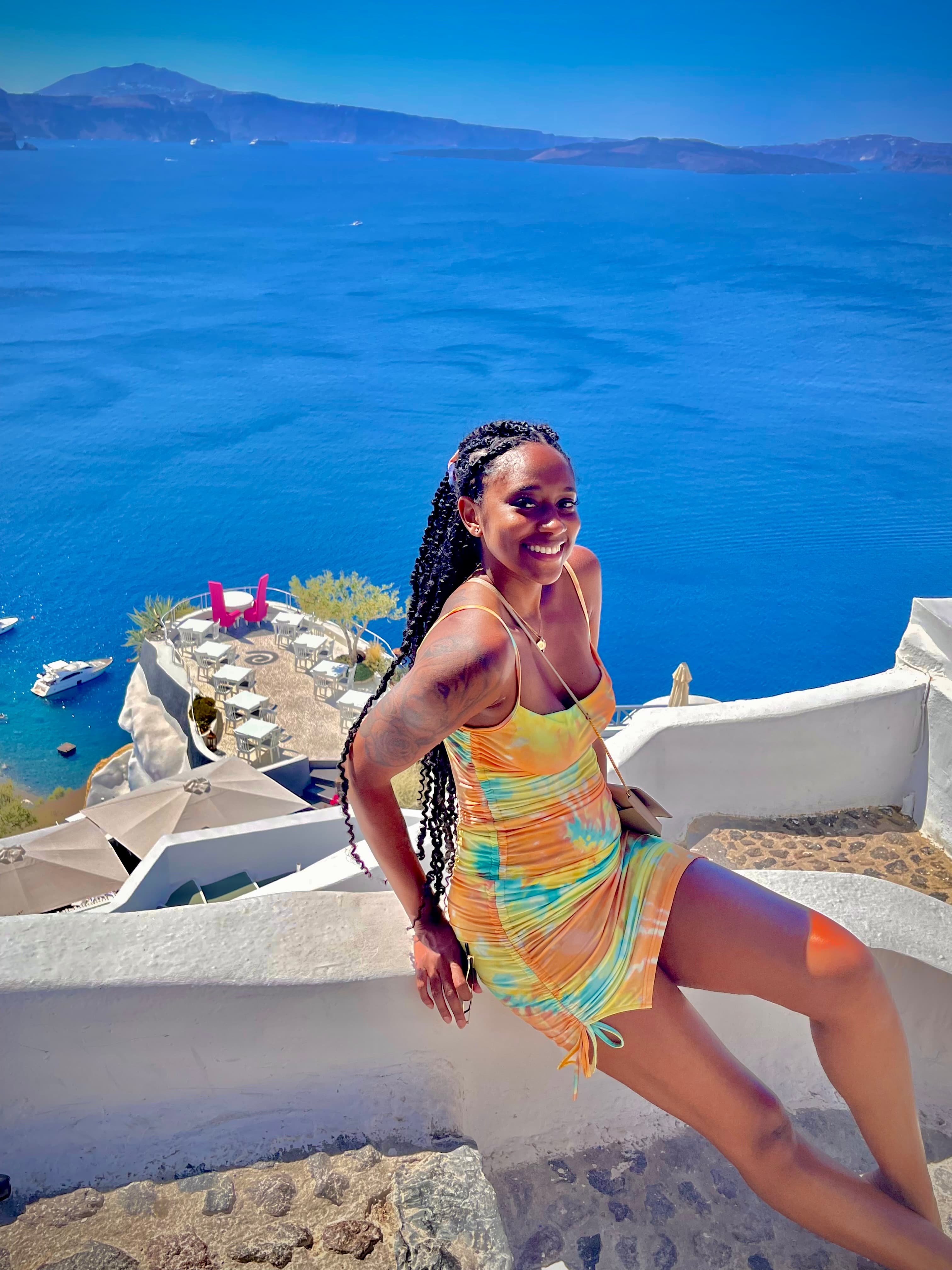 Advisor Brittany Archer taking picture in Santorini