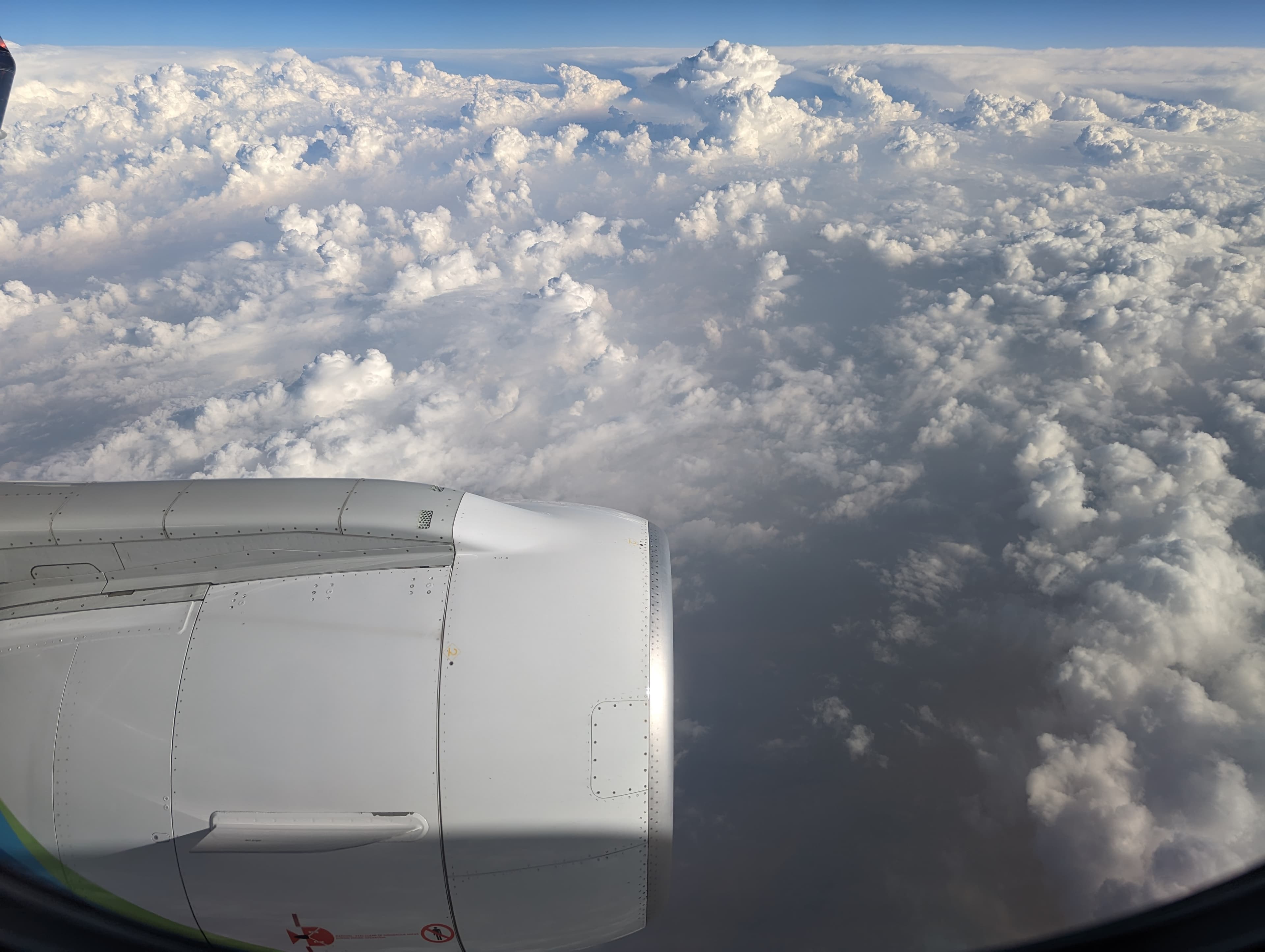 View of the clouds from plane window